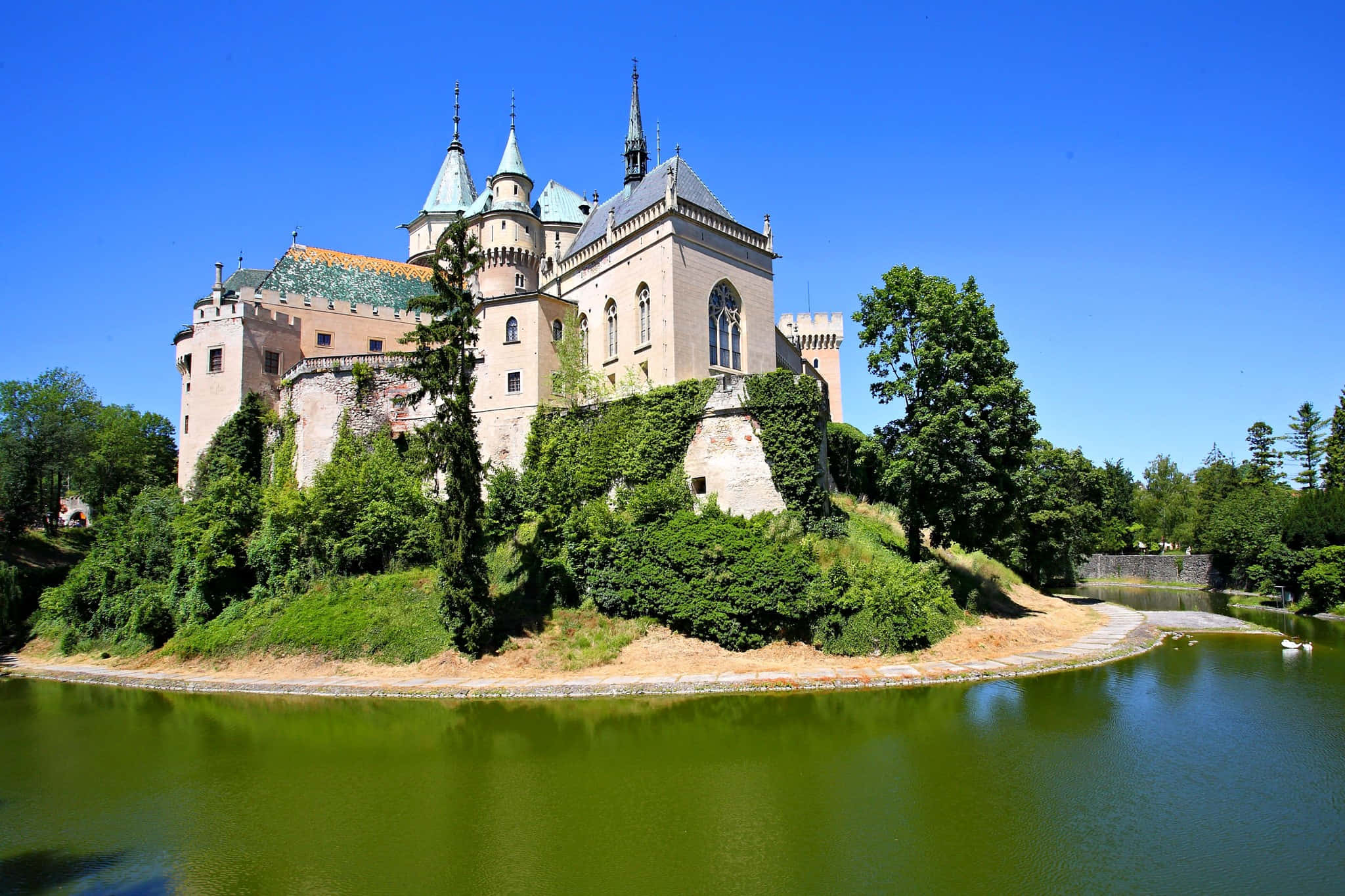 Bojnice Castle Surrounded By Water Wallpaper