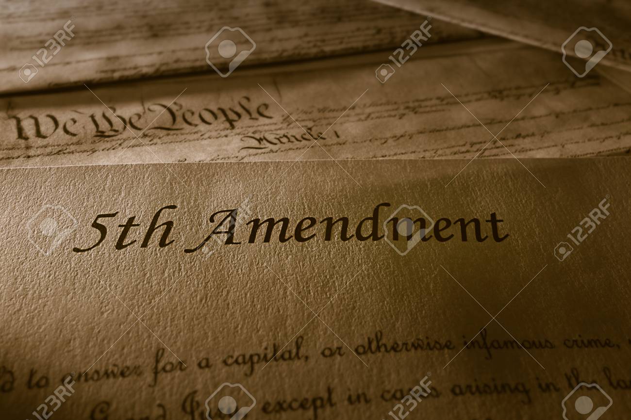 The 5th Amendment With Us Constitution In Background Stock