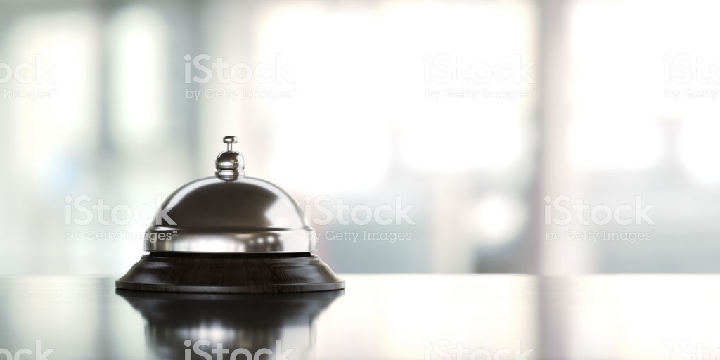 Concierge Bell Over Defocused Background Stock Photo