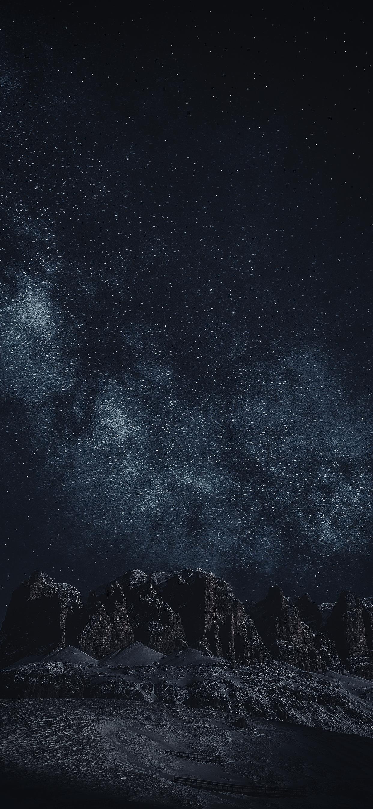 Black Rock Formation During Night Time iPhone X Wallpaper