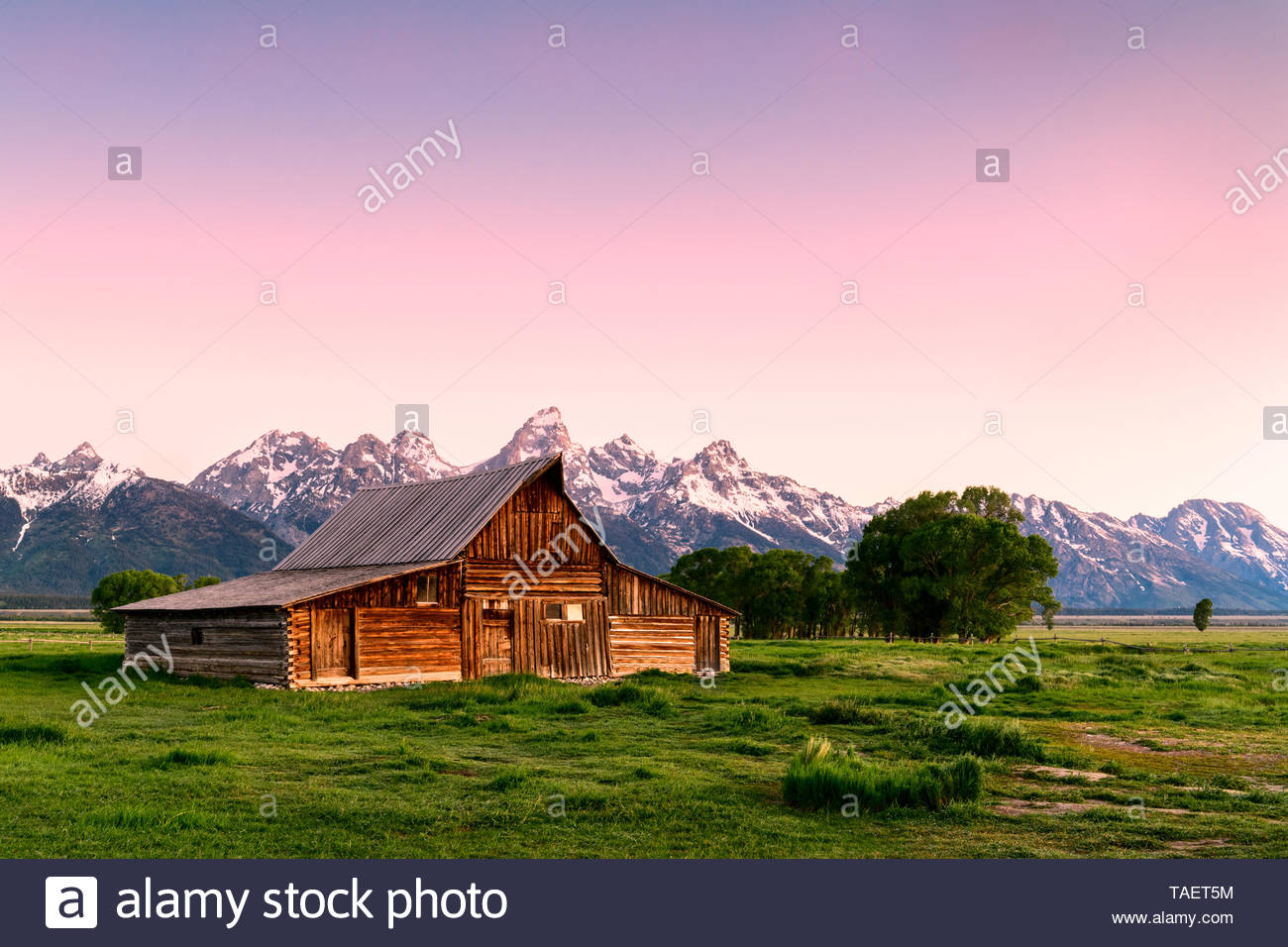 An Old Barn Along Mormon Row With The Grand Tetons In