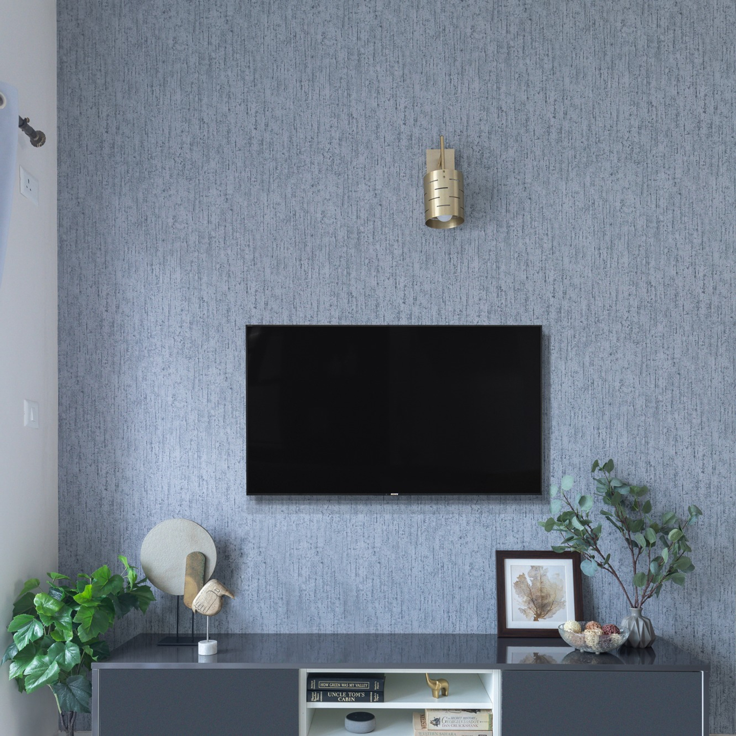Living Room Wallpaper With A Golden Sconce