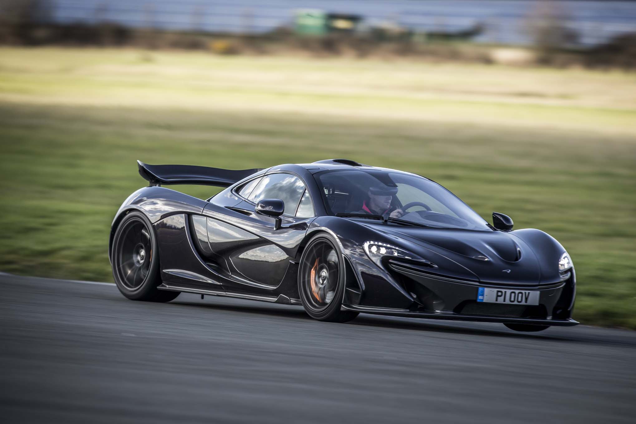 Mclaren p1 Black Front Three Quarter In Motion Photo