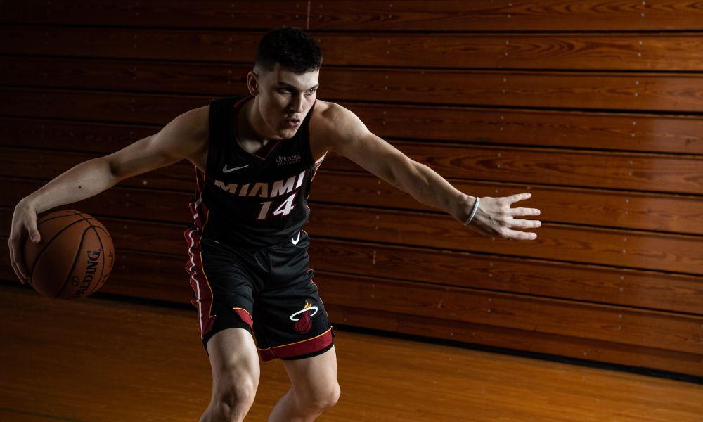 Tyler Herro Is Running And Having Basketball In Hand Wearing Black Sports  Dress In A Blur Audience Background HD Sports Wallpapers  HD Wallpapers   ID 38635