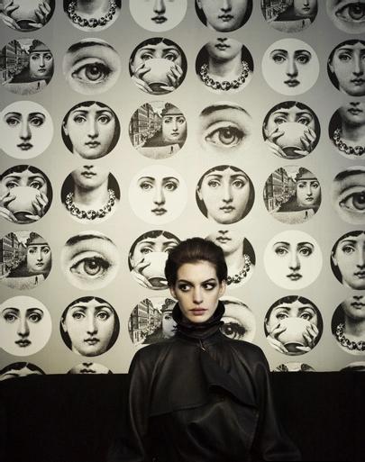 She Looks Stunning Against The Backdrop Of Piero Fornasetti Wallpaper