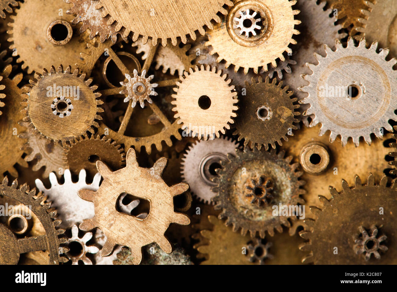 Steampunk gears background Aged mechanical clock wheels close up