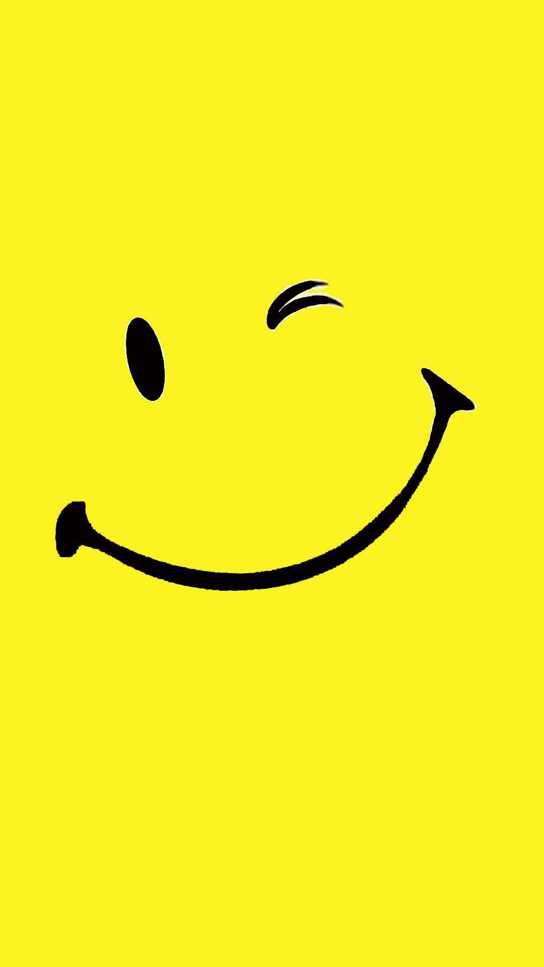 A classic yellow smiley face winking on a bright yellow background