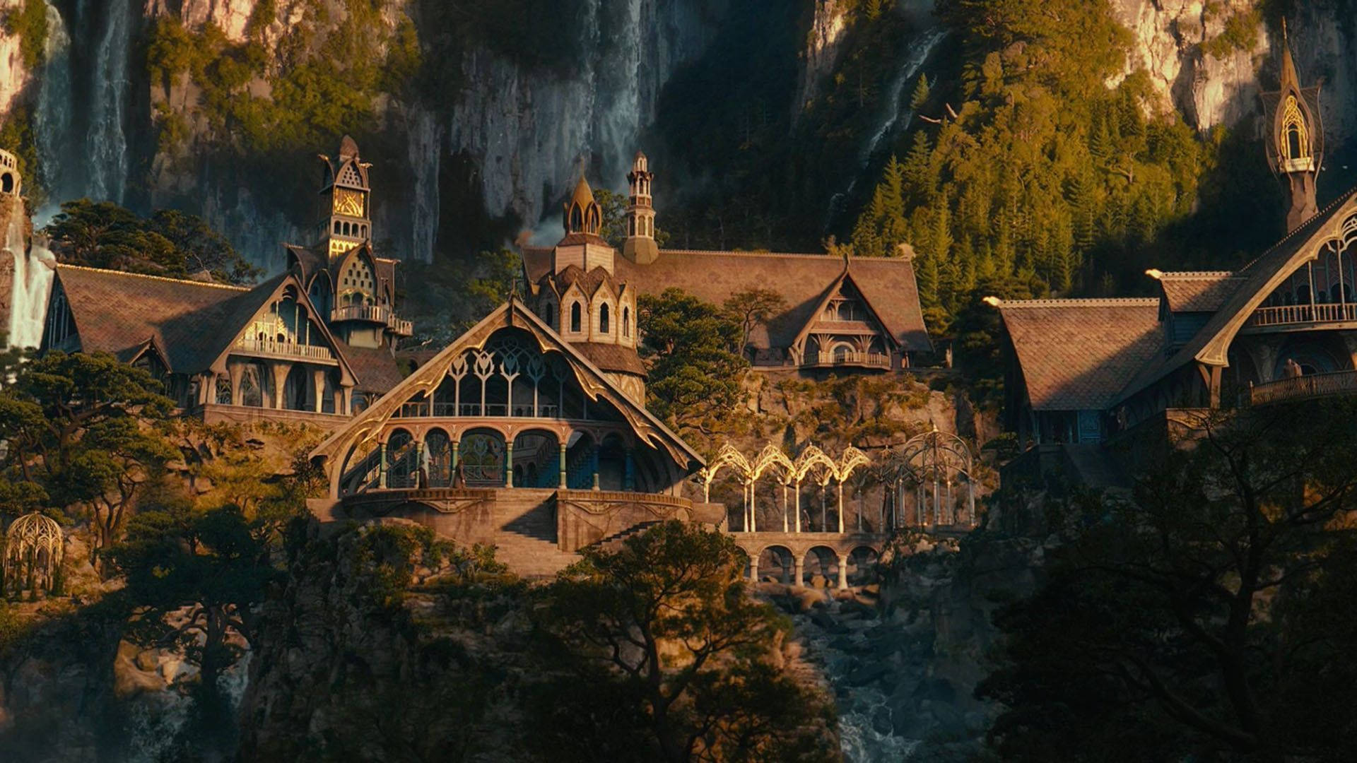 Rivendell, the elven city in Lord of the Rings, nestled in a valley with waterfalls and lush greenery