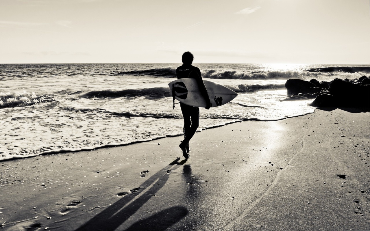 Surfer On The Ocean Beach Wallpaper