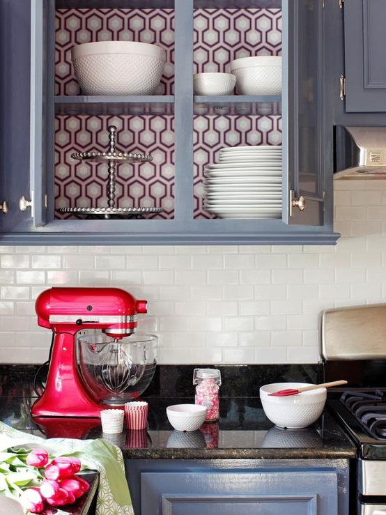 Kitchen cabinets with wallpapered cupboards