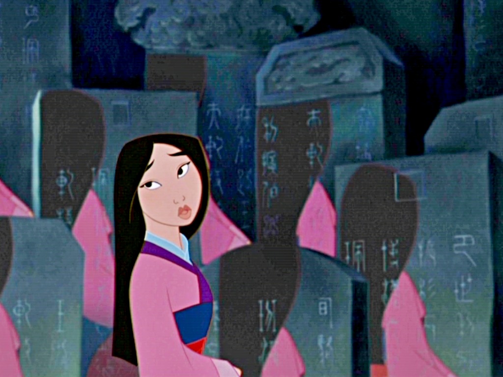 Mulan stands solemnly amidst a field of ancestral tablets, a poignant scene from the Disney film
