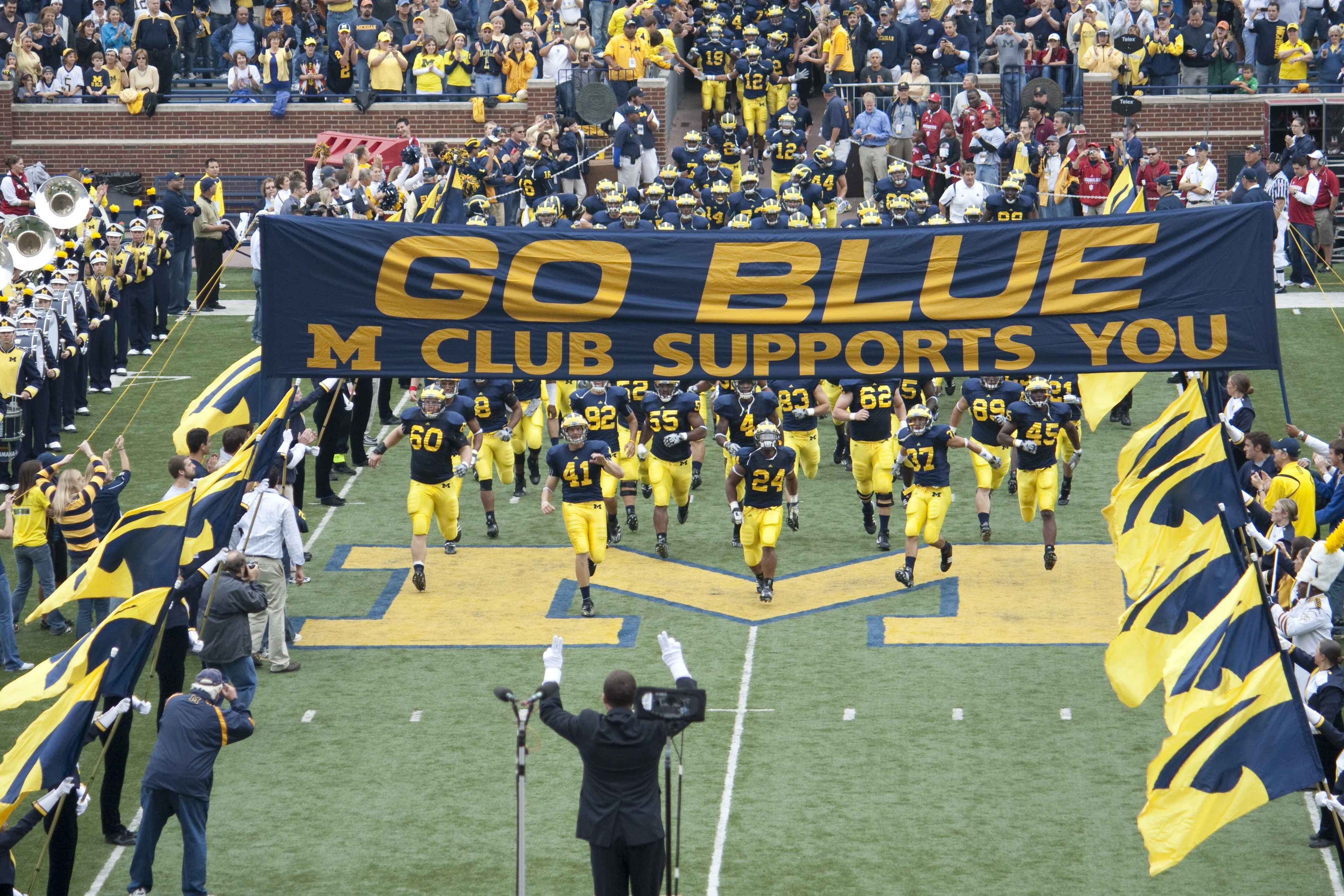 File Michigan Wolverines Football Team Enters The Field With