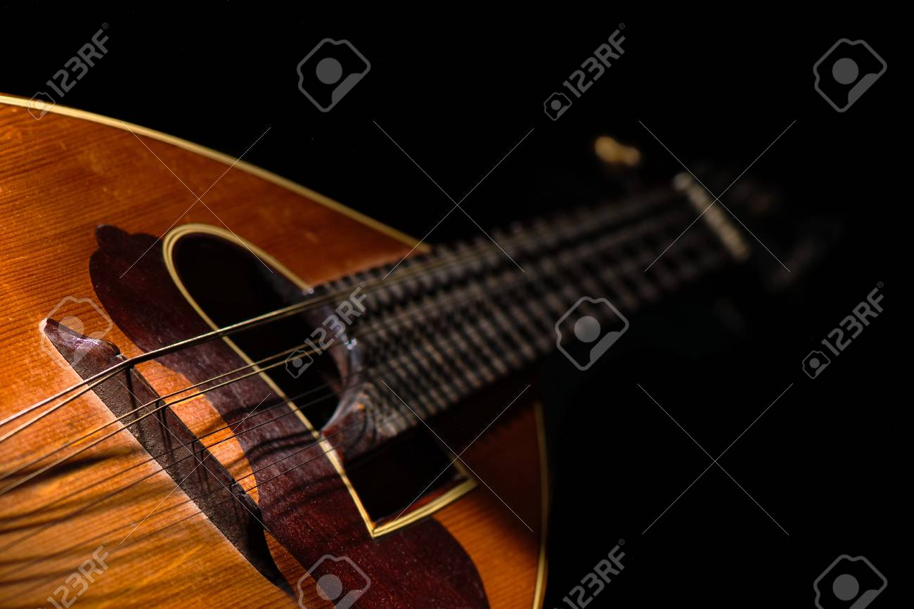 Detail Of A Italian Mandolin With Black Background Stock Photo