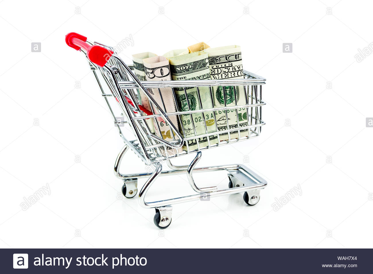 Silver Shopping Trolley Full Of American Dollars On White