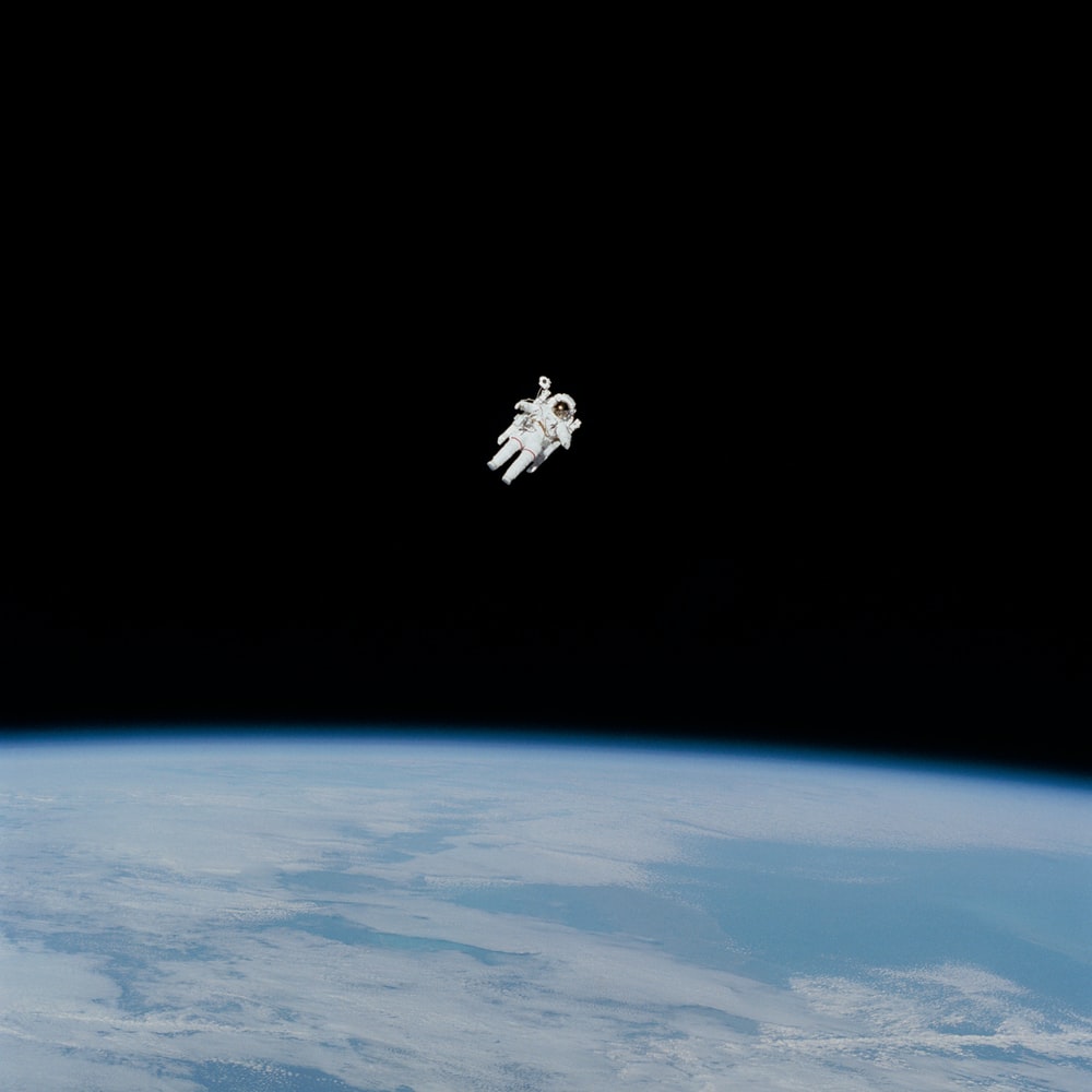 Astronaut In Spacesuit Floating Space Photo Image