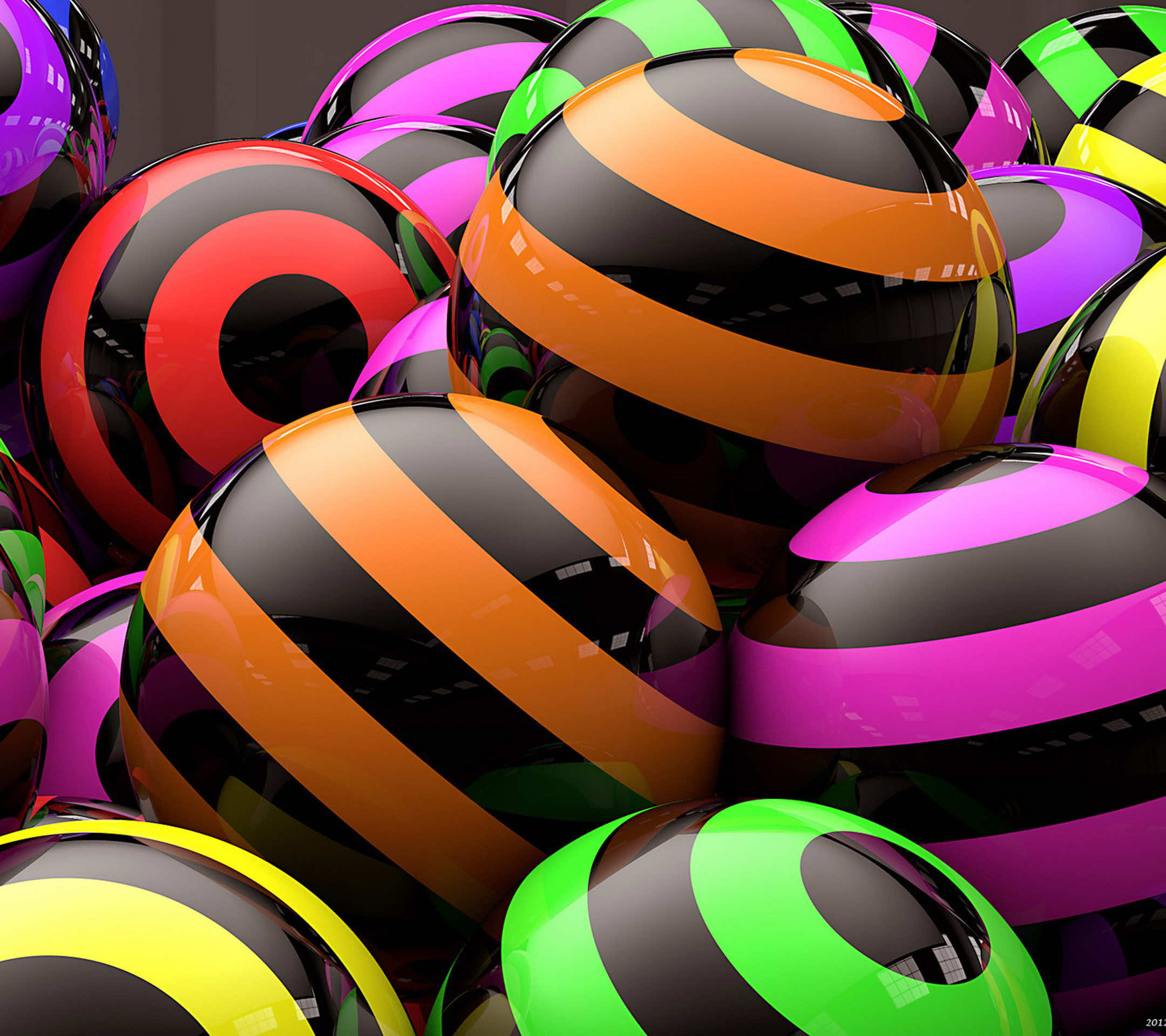A collection of vibrant, glossy spheres with swirling stripes in various colors, ideal for a dynamic live wallpaper