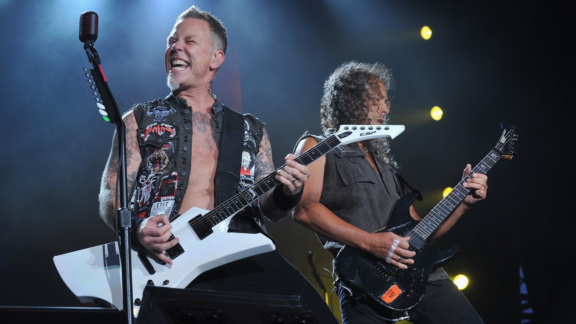 James Hetfield and Kirk Hammett of Metallica performing live on stage