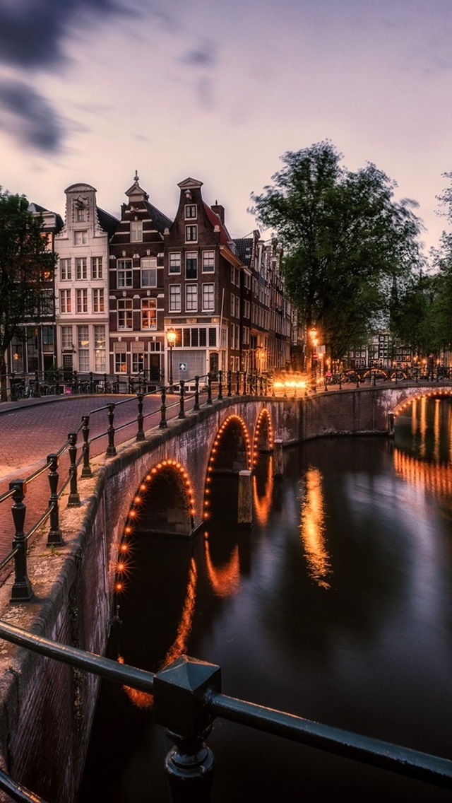 Amsterdam Netherlands bridge river lights city night 640x1136
