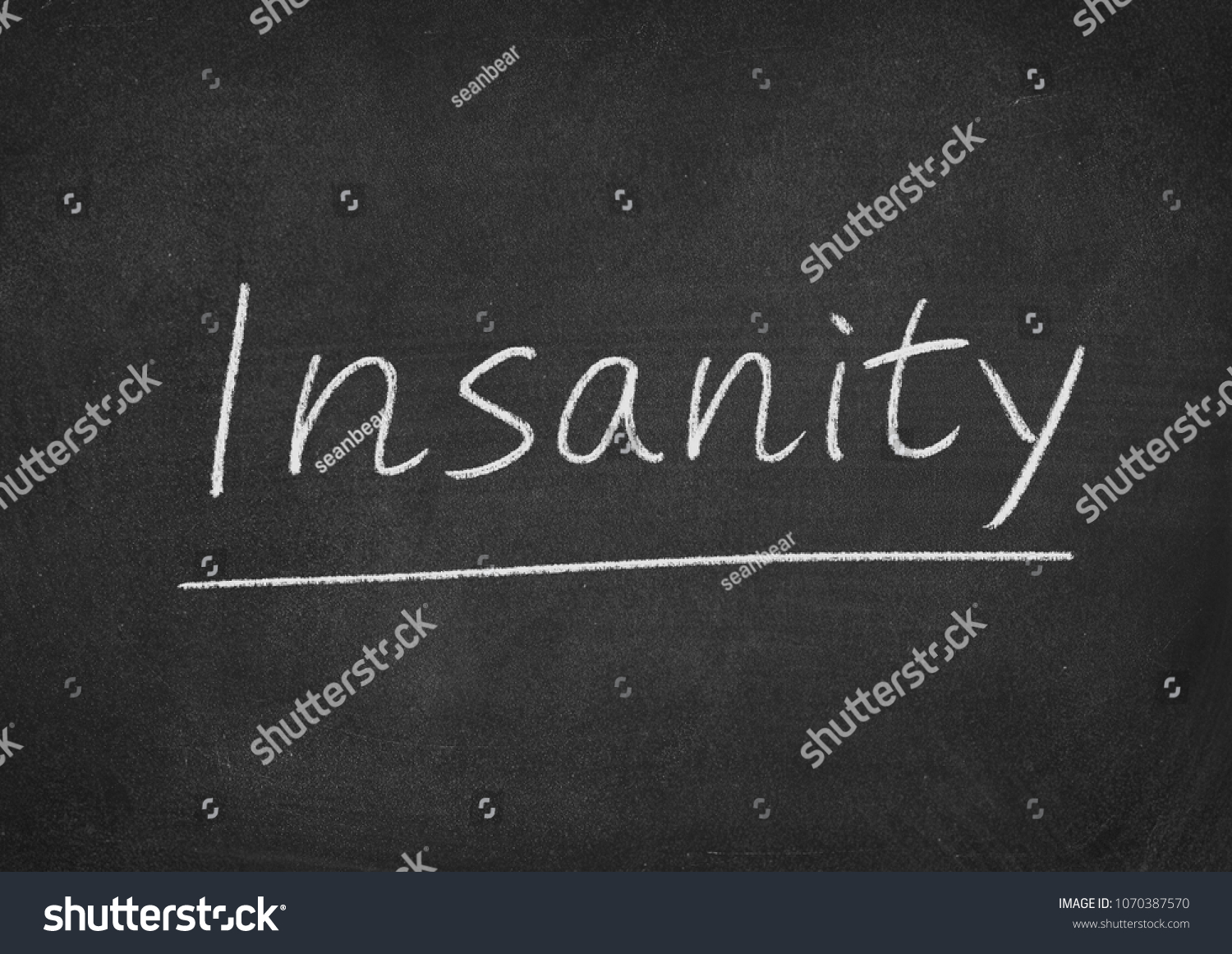 Free download Insanity Concept Word On Blackboard Background Stock