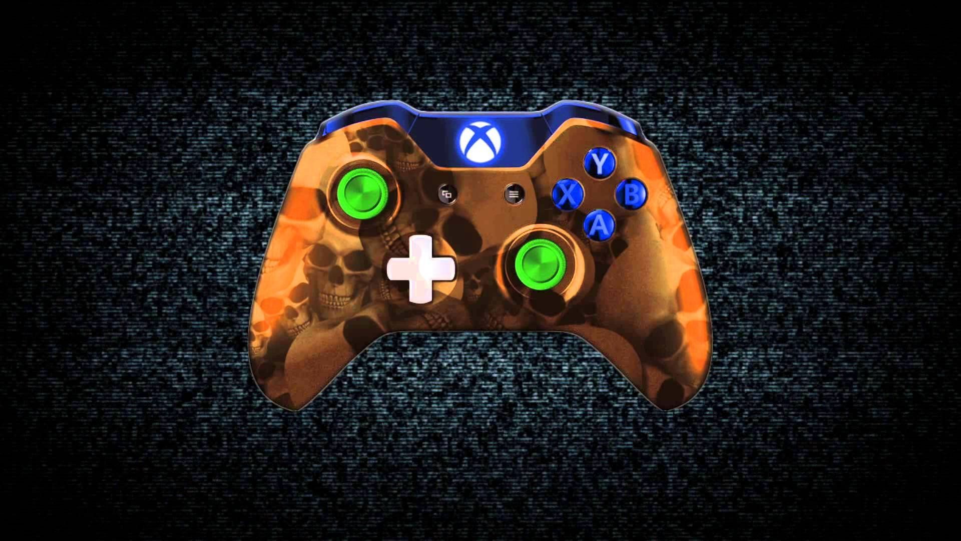 Close-up of a custom Xbox One controller with a spooky orange skull design on a dark digital background