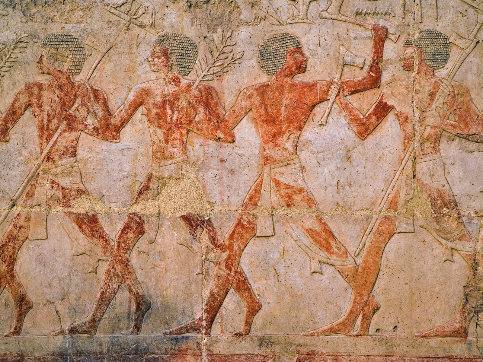 Ancient Egyptian Figures At Temple Of Karnak Luxor Egypt Wallpaper