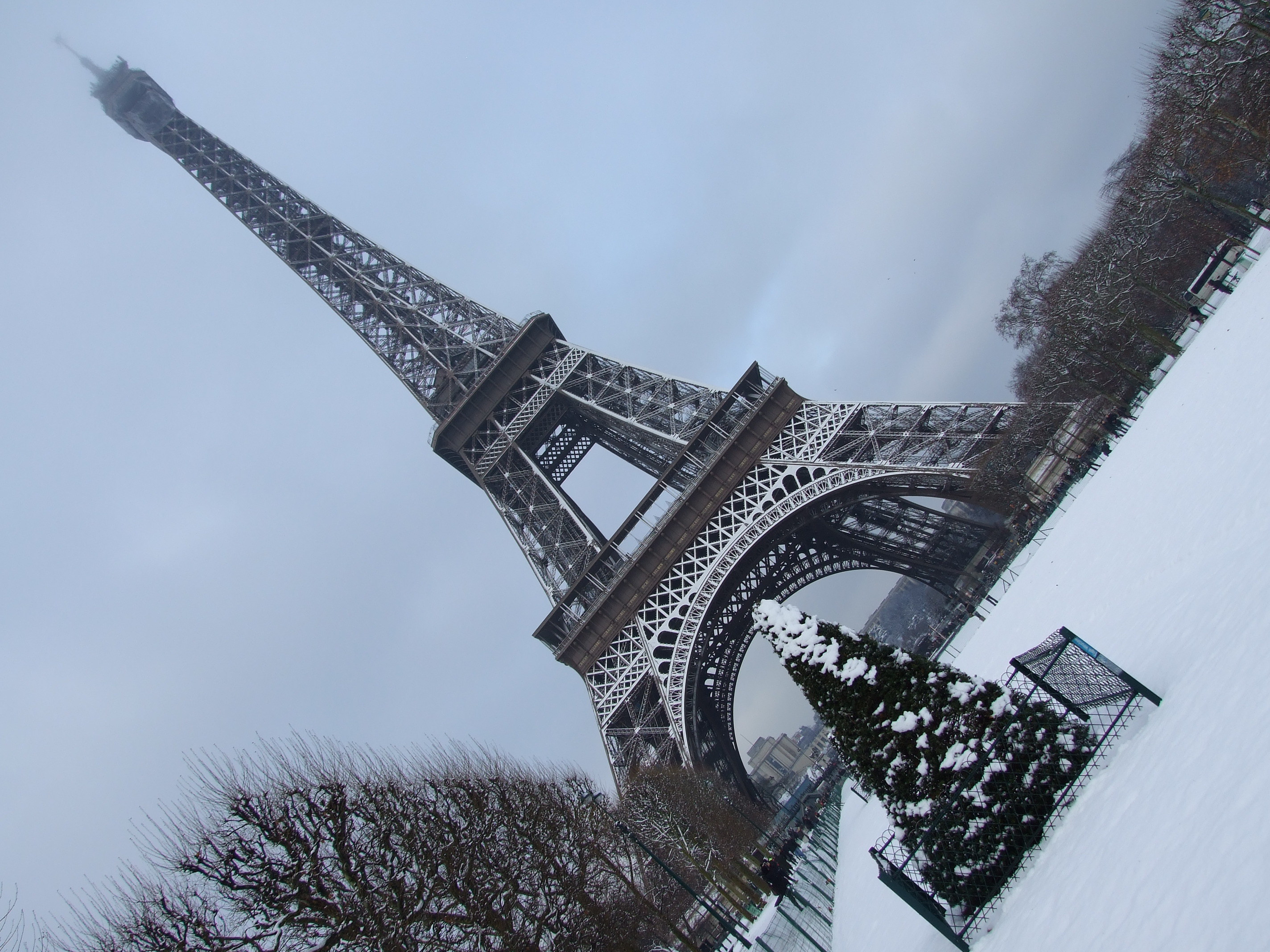Snow In Paris Eiffel Tower Tilted Wallpaper And Image