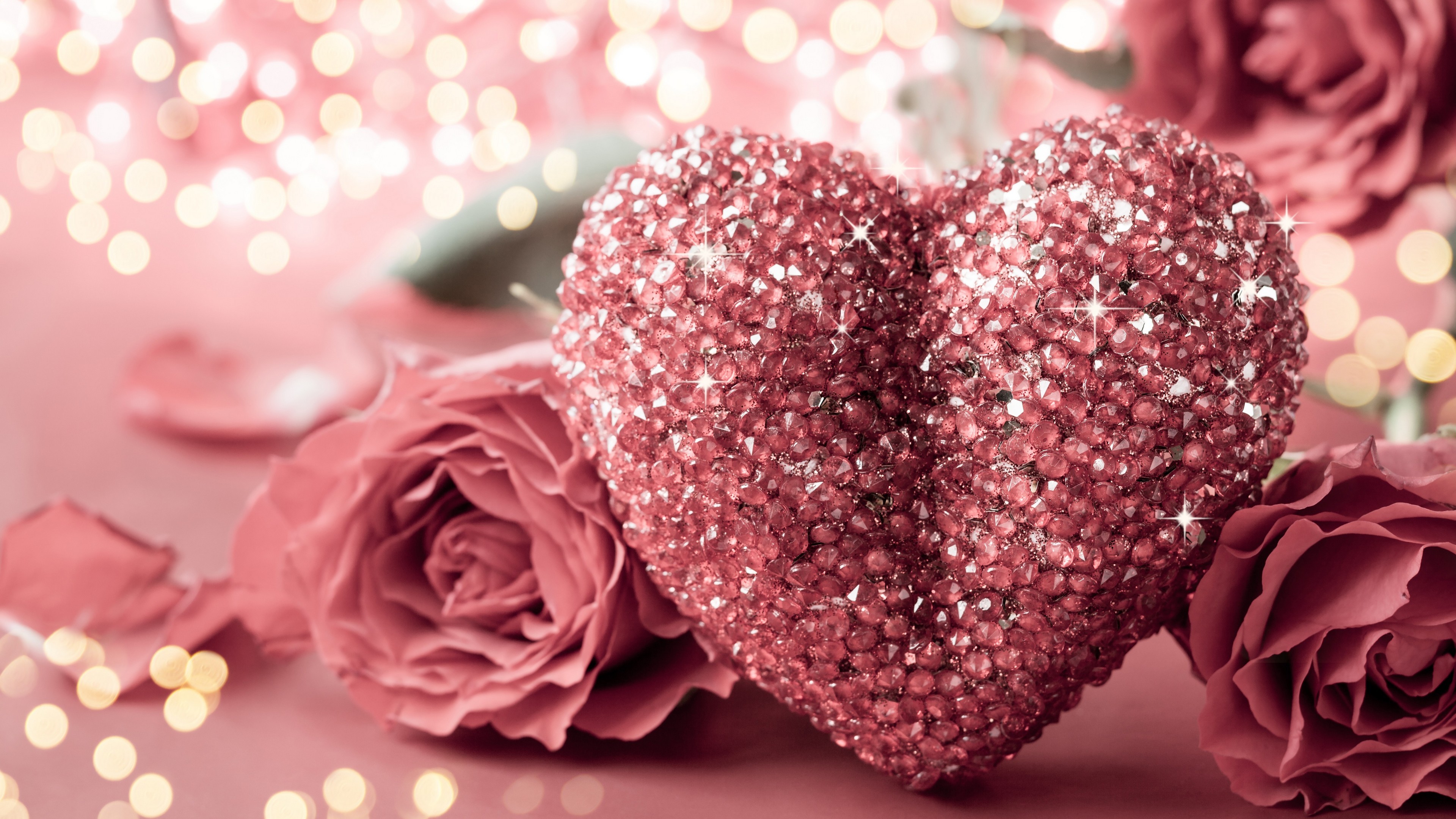 A sparkling, jeweled heart nestled among delicate pink roses, set against a backdrop of twinkling lights, perfect for Valentine's Day or romantic occasions