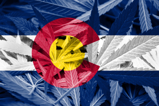 Colorado Flag On Cannabis Background Stock Photo Thinkstock