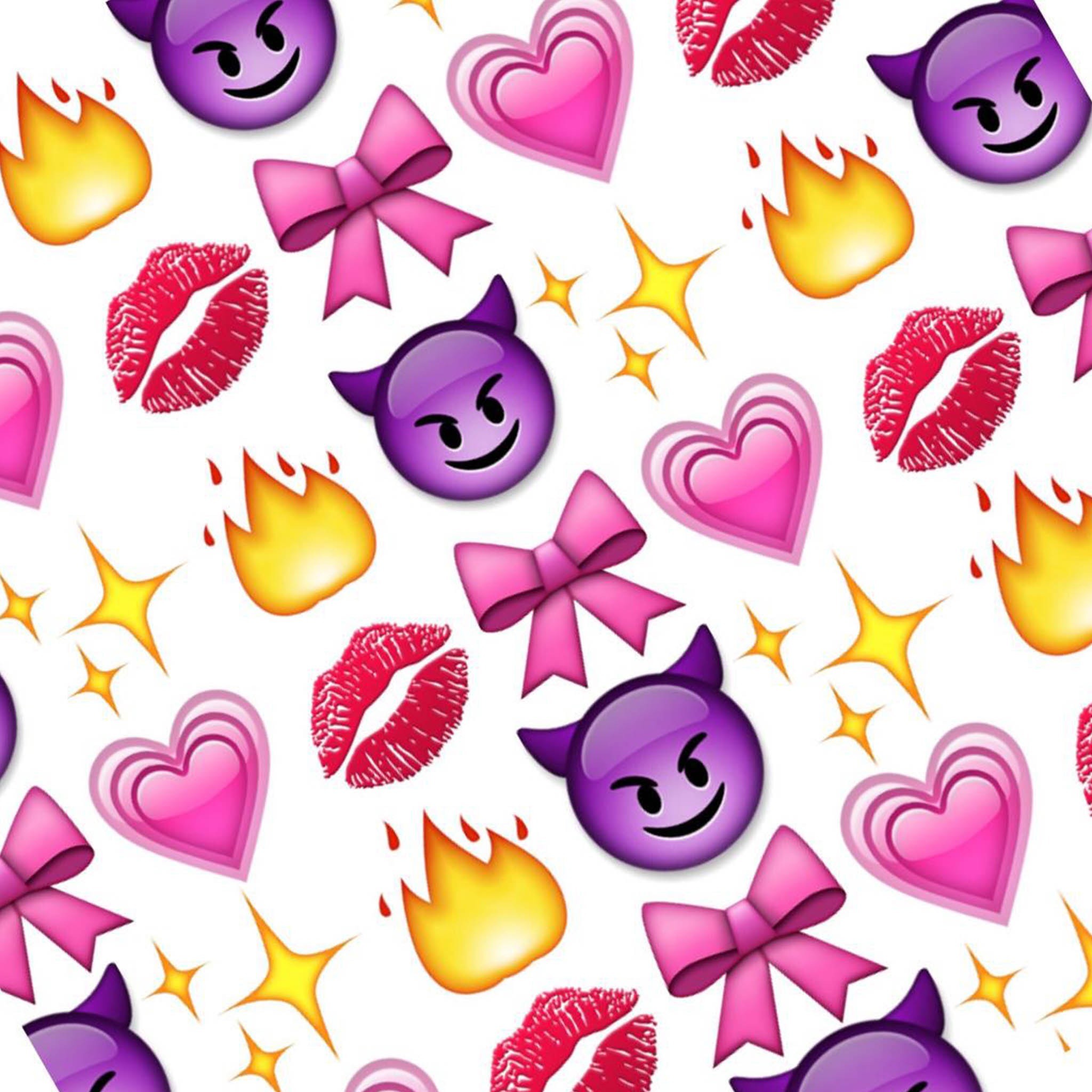Seamless pattern of emojis including devil faces, hearts, flames, bows and kiss marks on white background