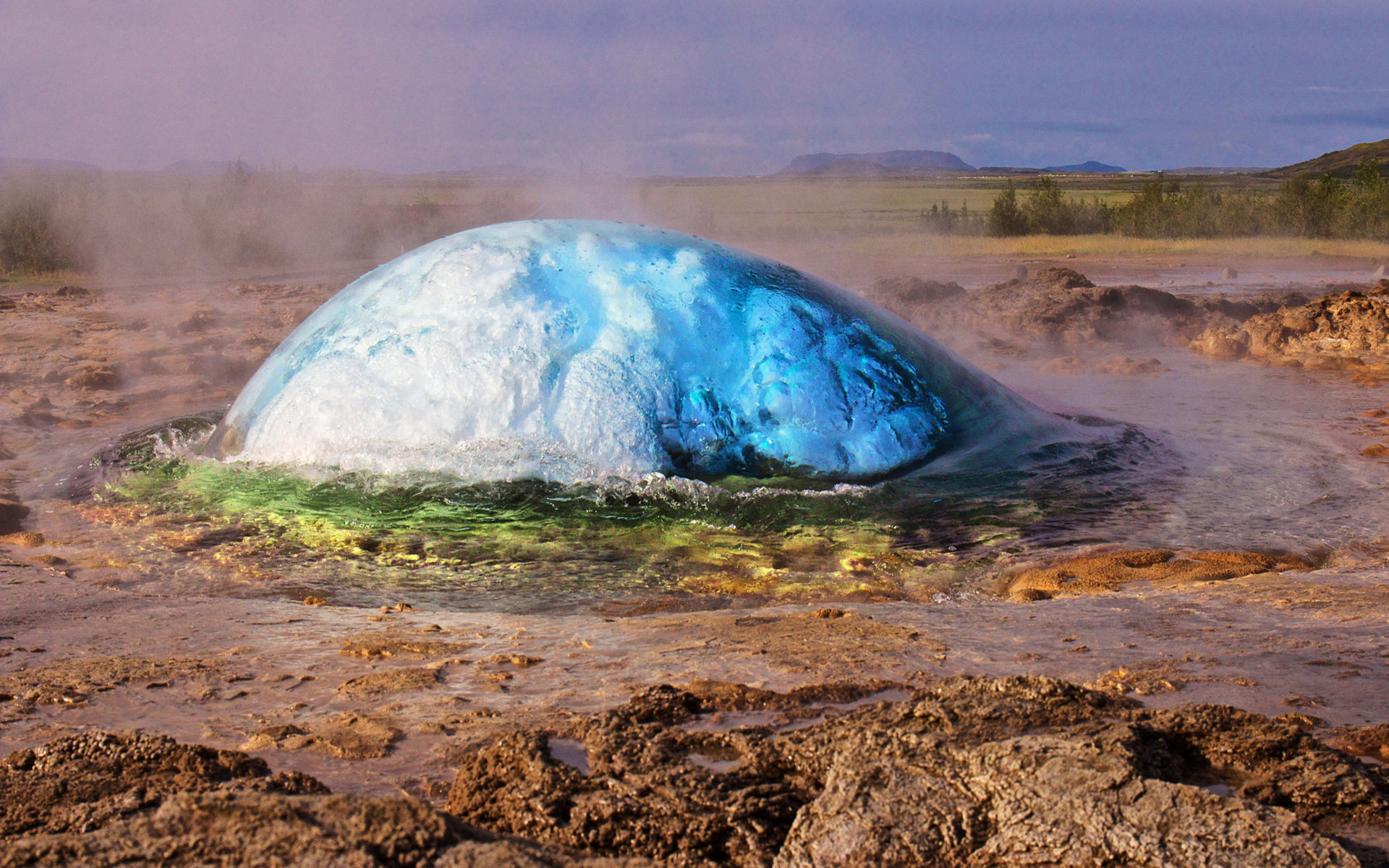 Strokkur Geyser Water Explosion Geothermal Area Along The River