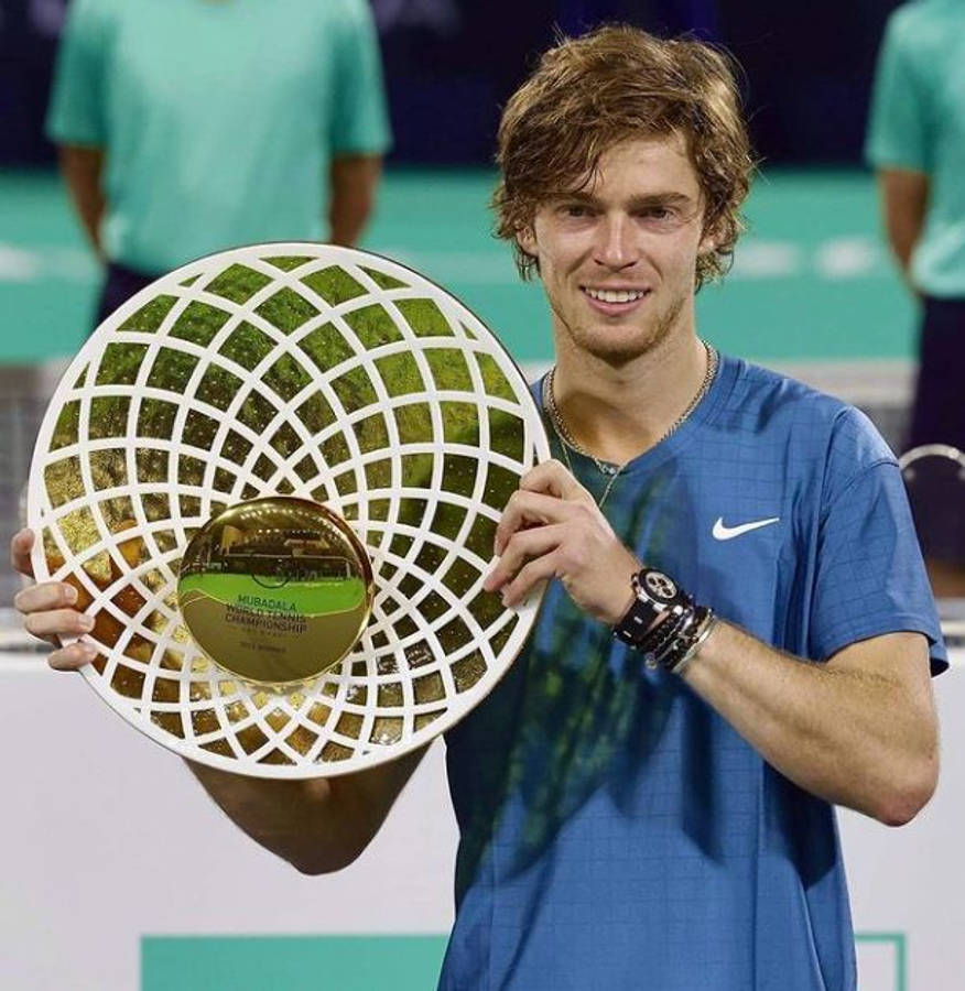 Andrey Rublev With Championship Trophy Wallpaper