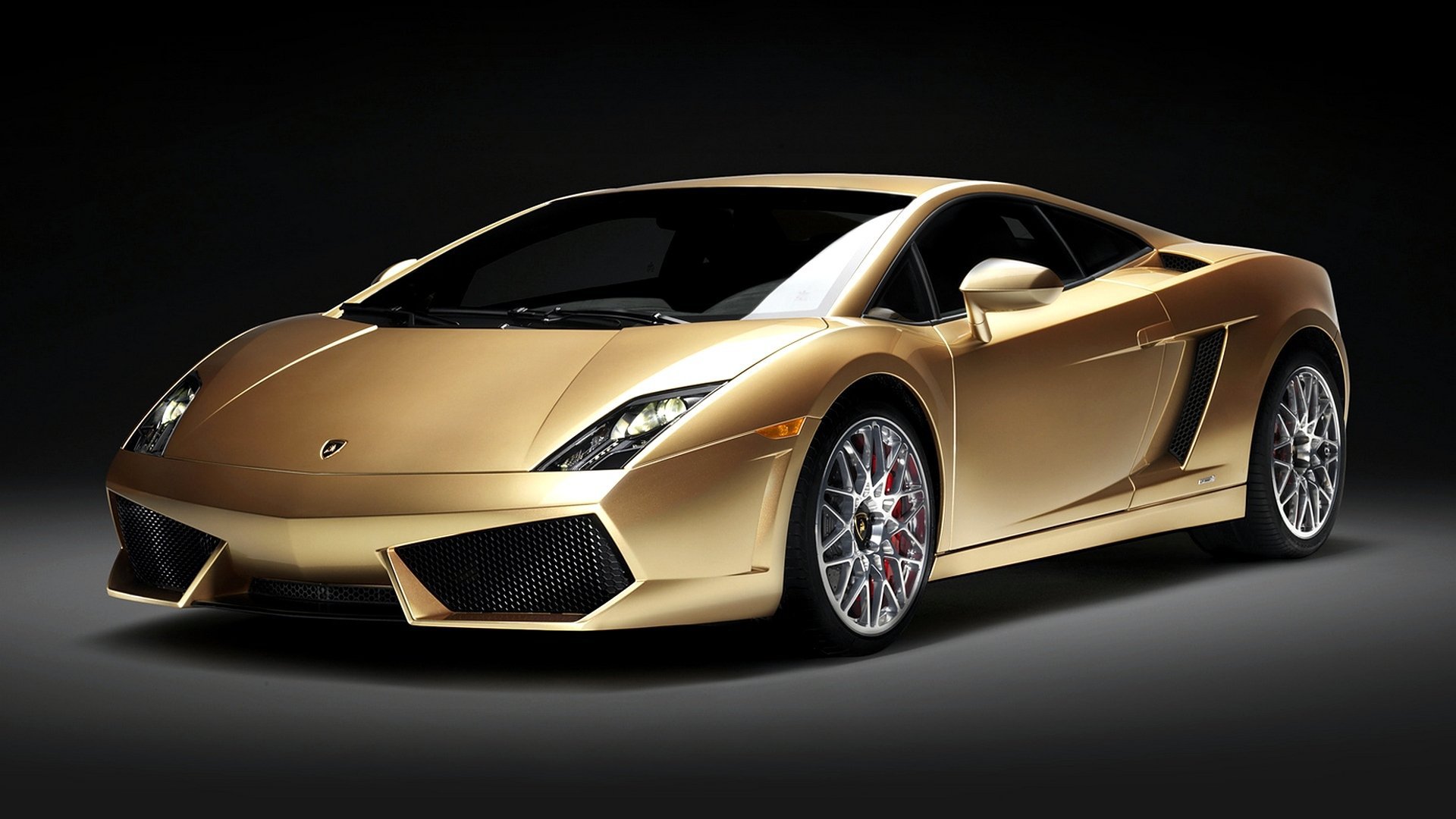 Gold Lamborghini Gallardo on a Dark Background