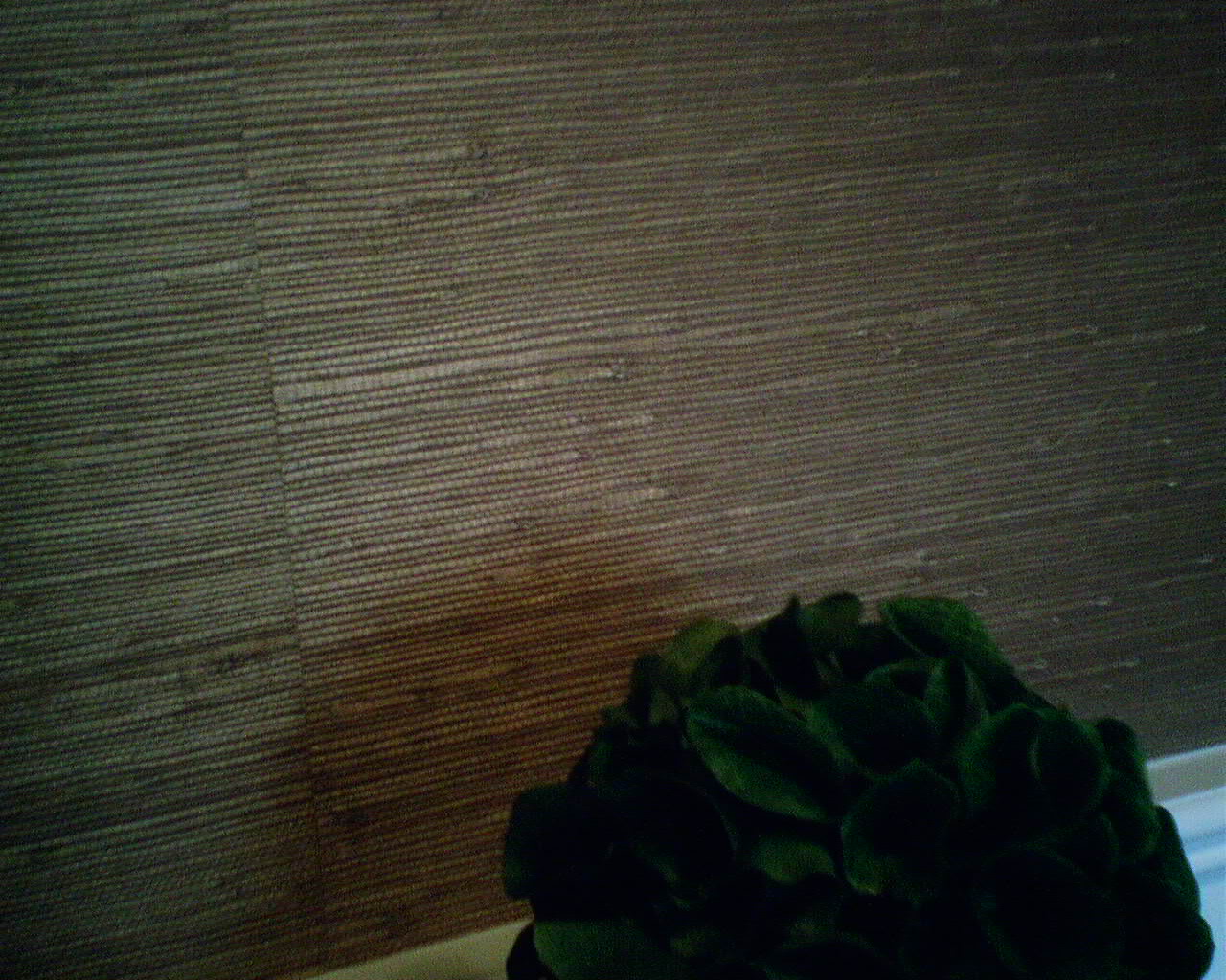 Phillip Jeffries Juicy Jute Grasscloth in an Entry Dining Room