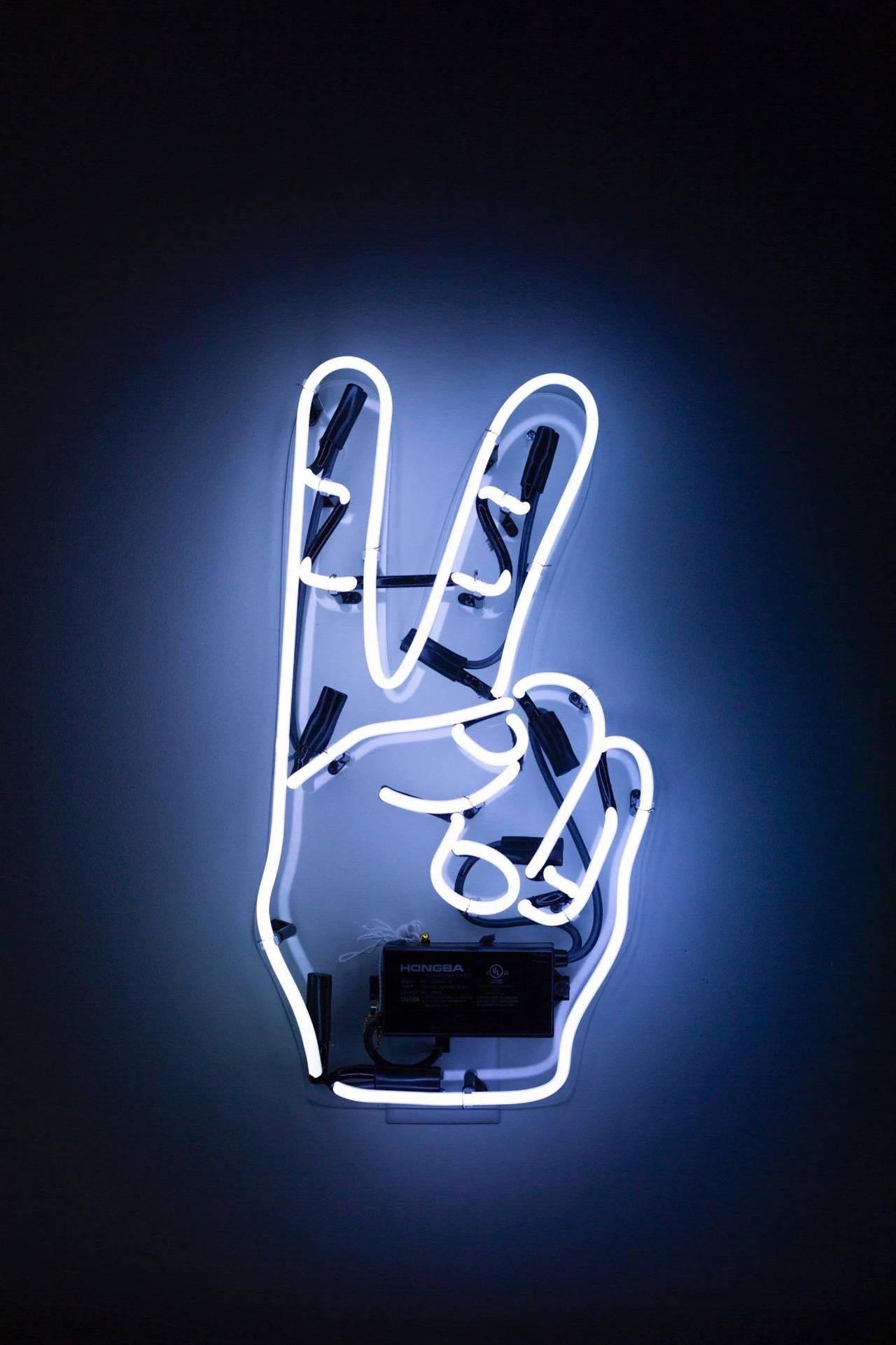 Dynamic 4k Neon iPhone Wallpaper Featuring A Peace Signage In Vibrant Colors