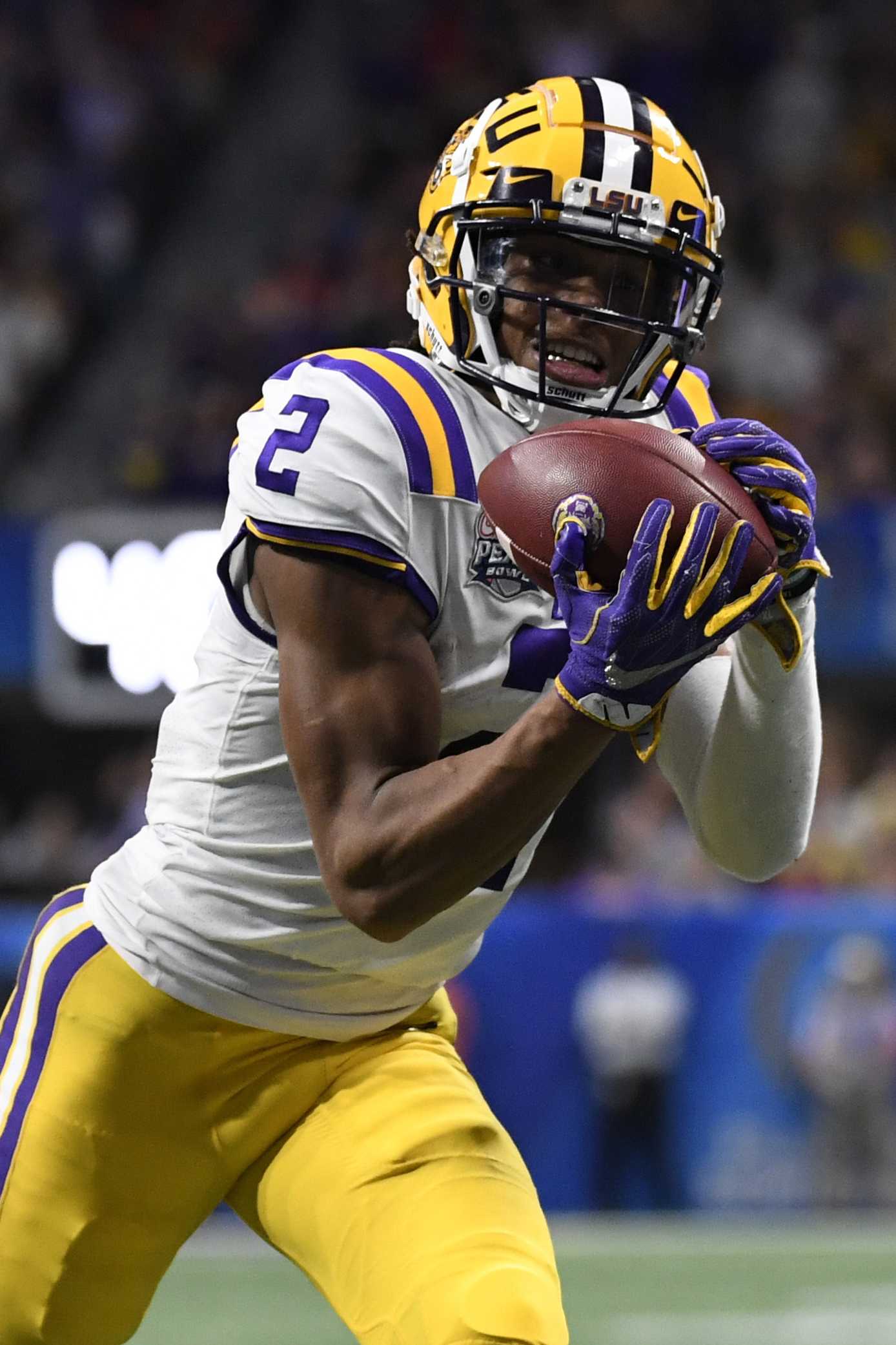 LSU wide receiver Justin Jefferson making a catch during a football game