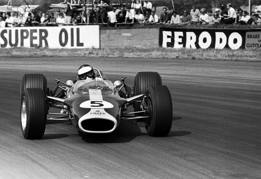 Jim Clark Holds A Huge Slide In Lotus Formula Photos Espn