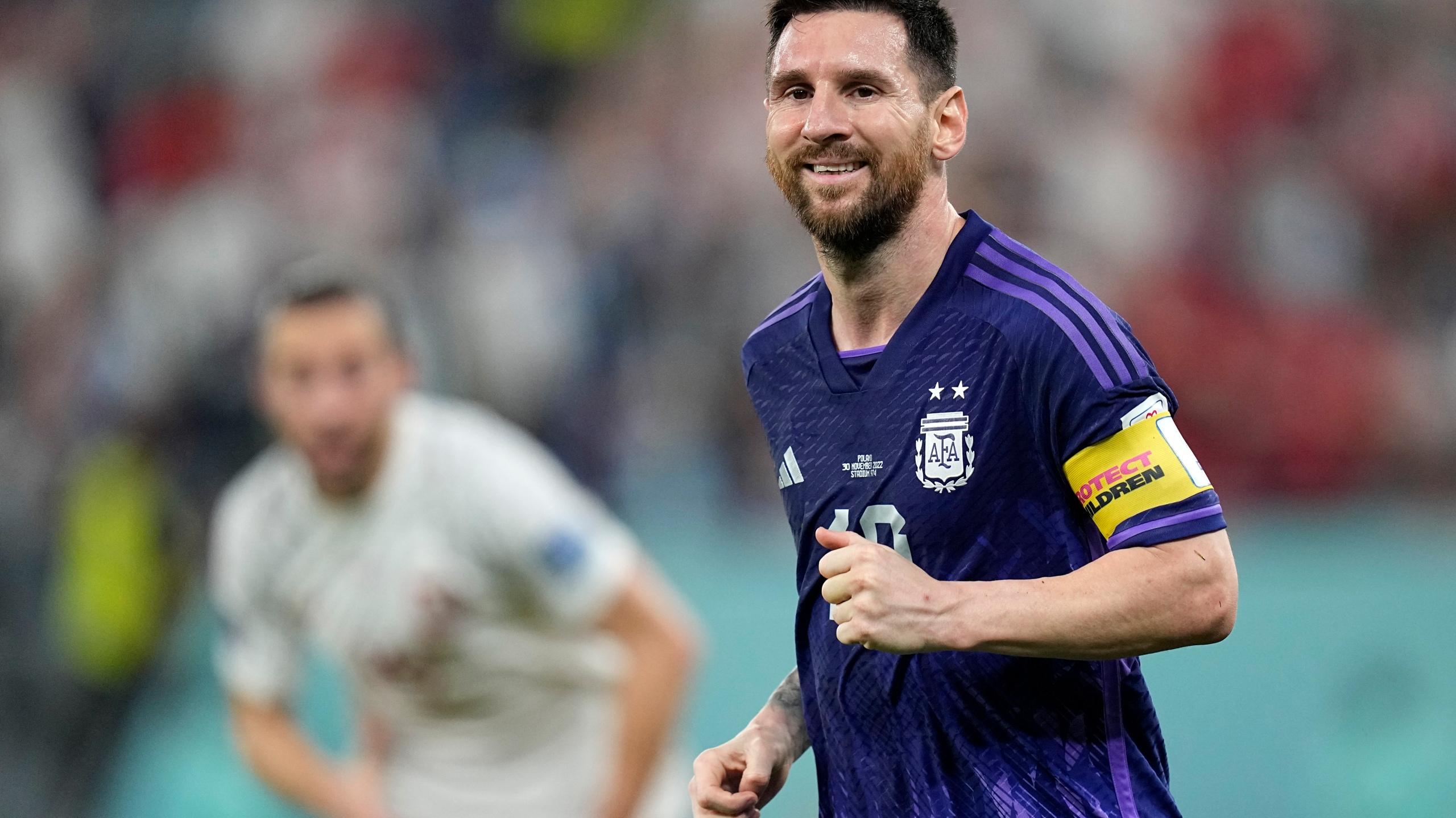 Messi and Argentina advance at World Cup beat Poland 2 0