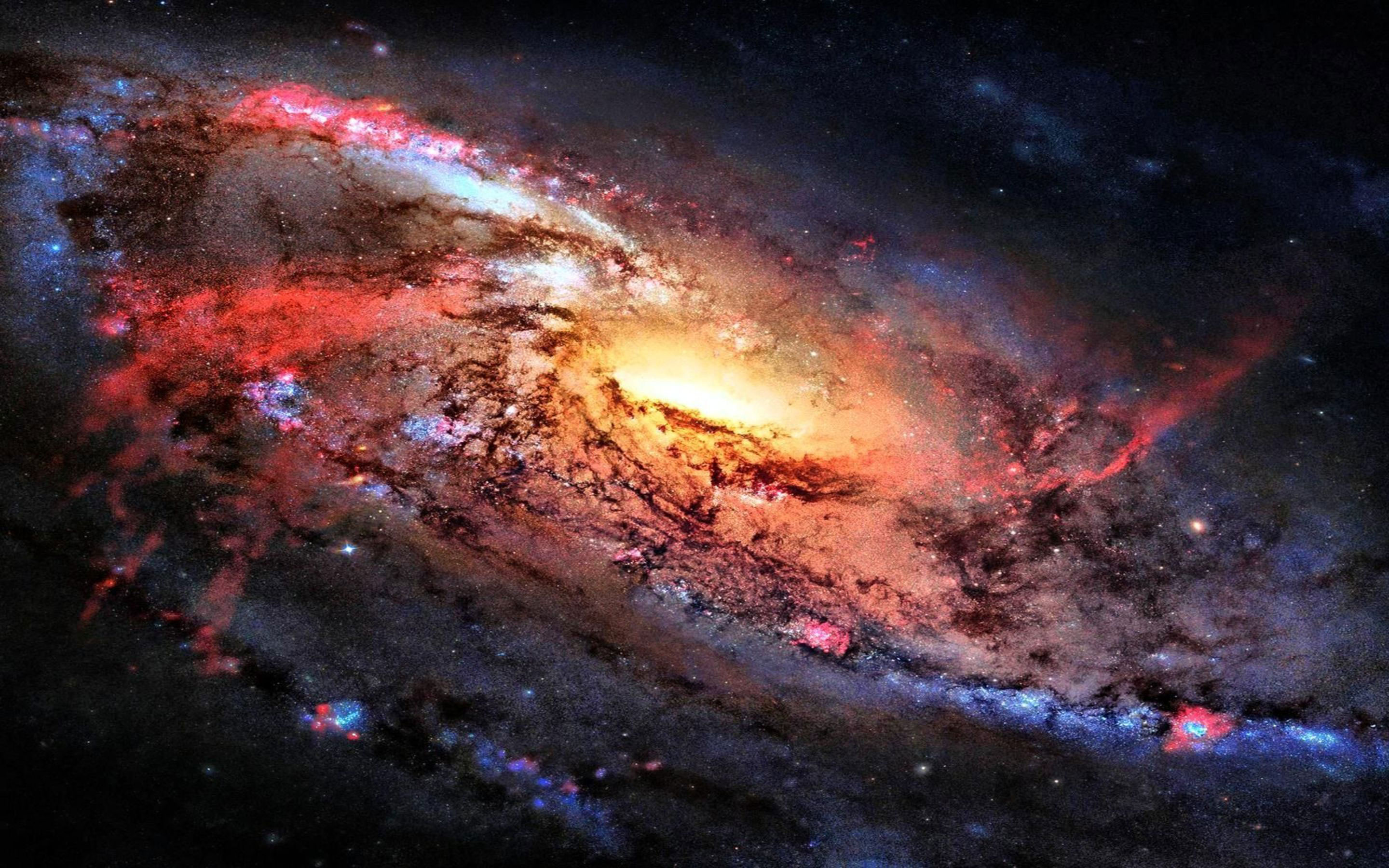 A breathtaking view of a spiral galaxy with colorful nebulae and a bright core
