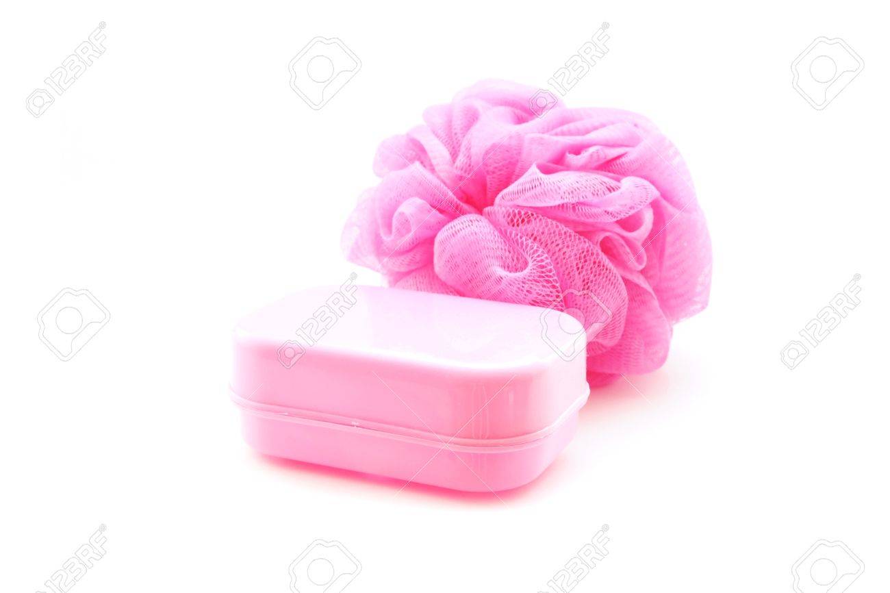 Pink Soapbox And Shower Scrubber On White Background Stock Photo