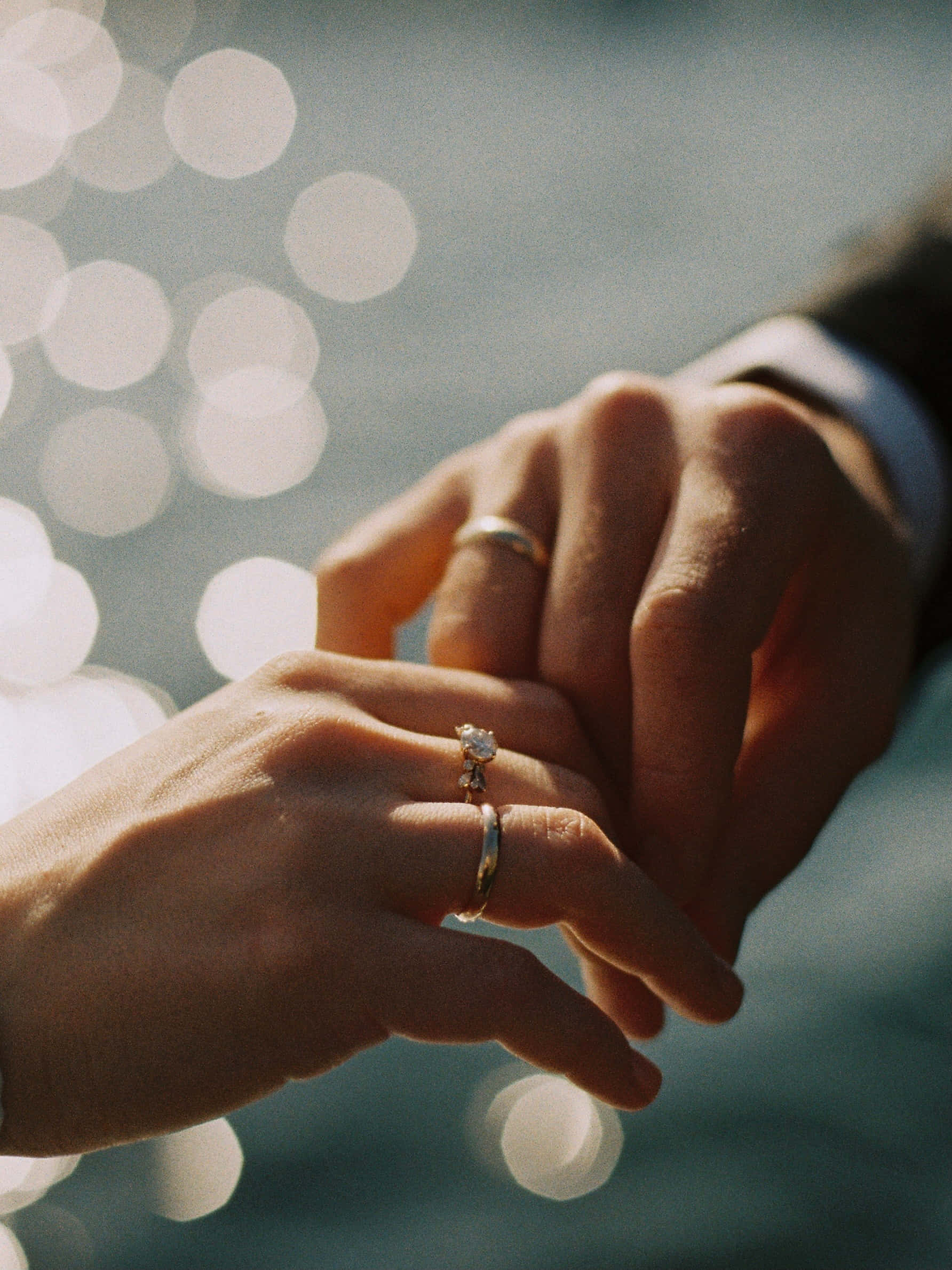 Husband And Wife Hands Wedding Ring Wallpaper