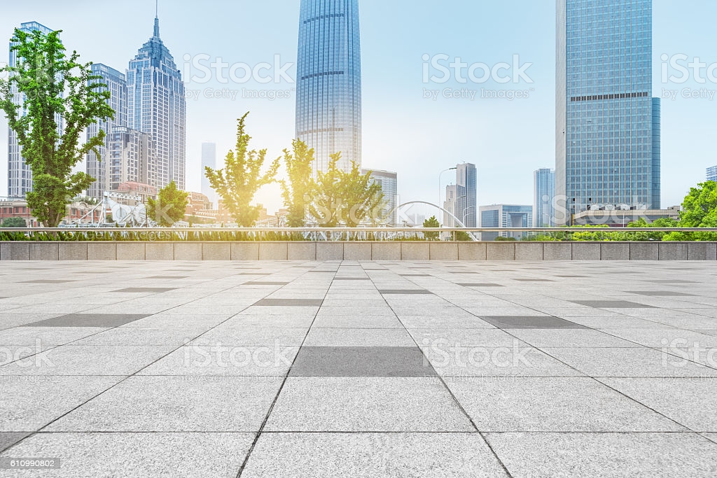 Empty Brick Floor With City Skyline Background Stock Photo