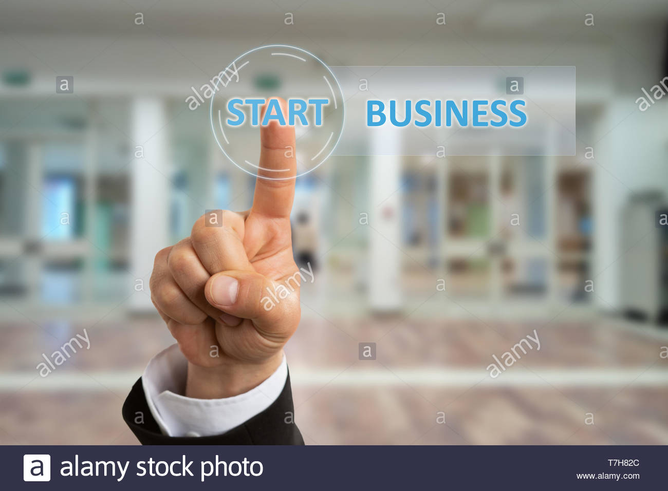 Businessman Wearing Suit Touching Start Business Button With Index