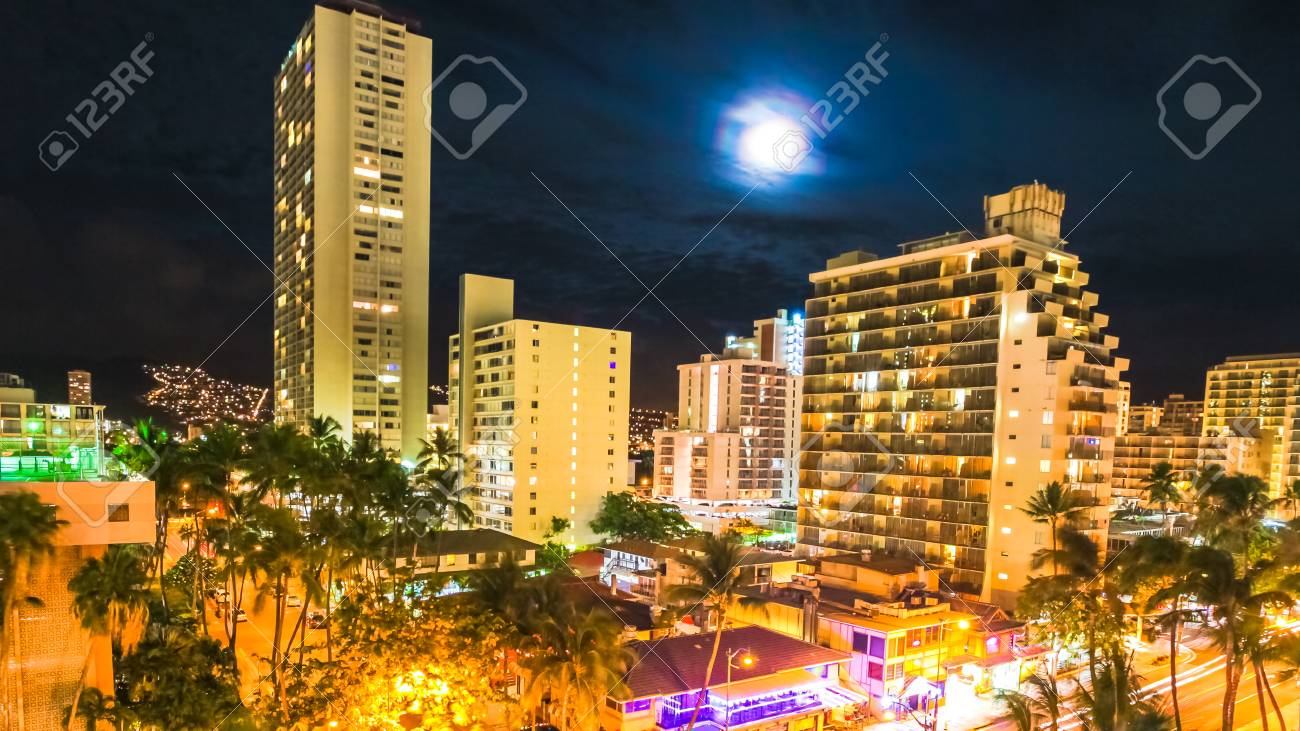 Moonlight Aerial On Night Traffic Of Waikiki City In Oahu