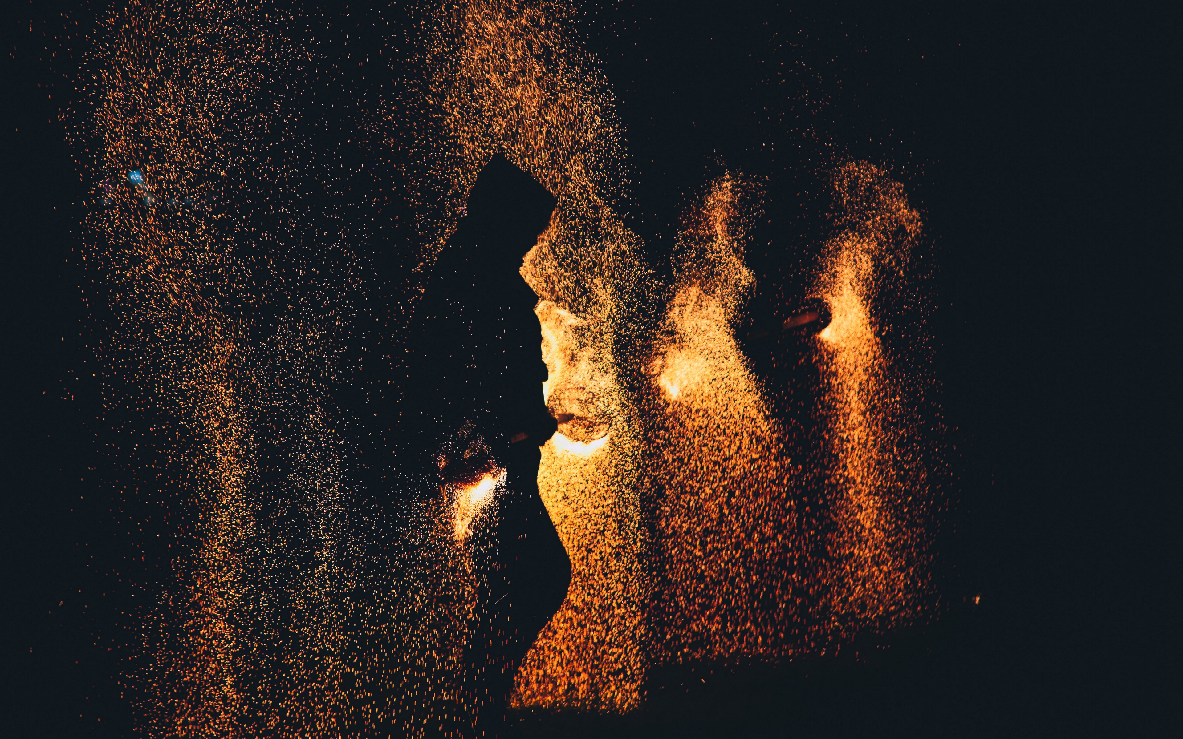 Download wallpaper 3840x2400 silhouette torches sparks fire