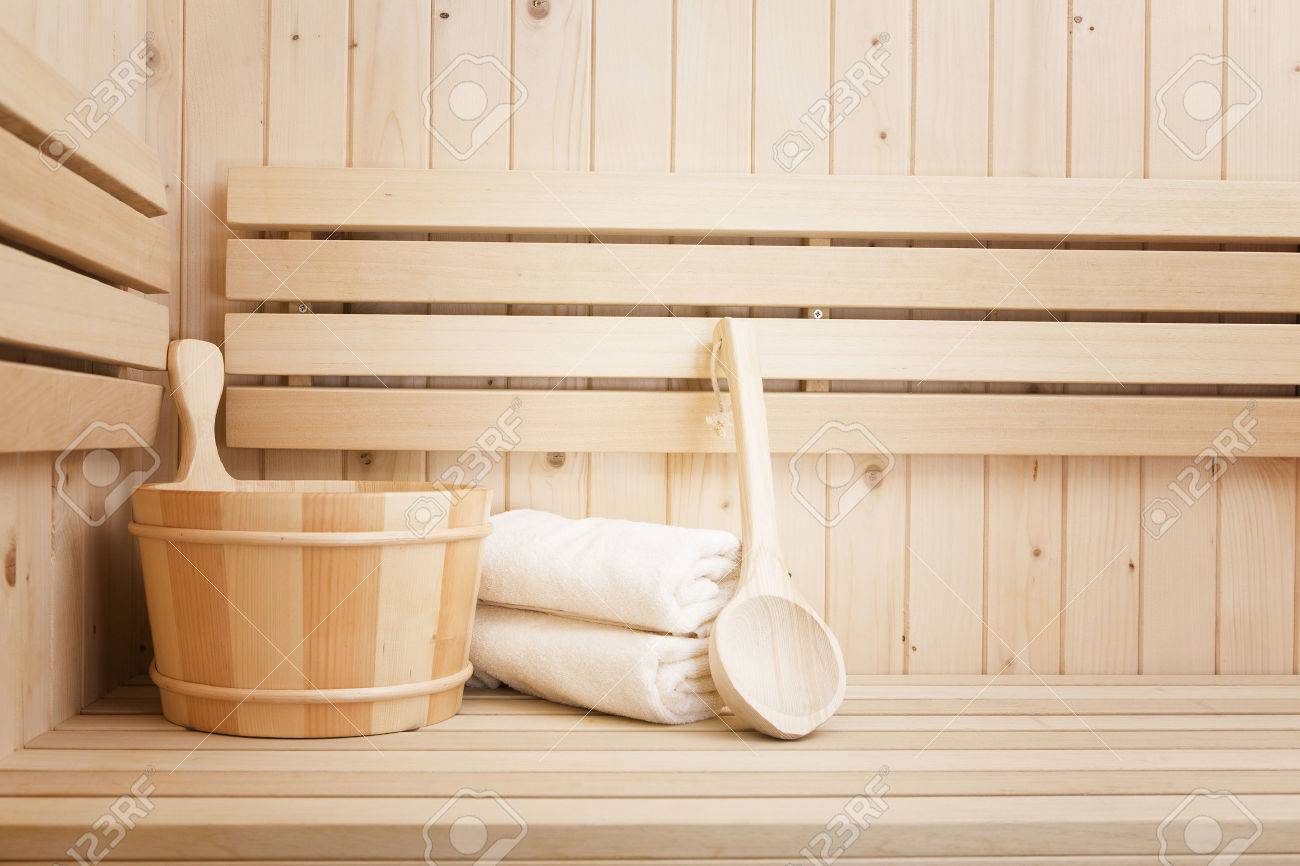 Detail Of Bucket And White Towels In A Sauna Wellness