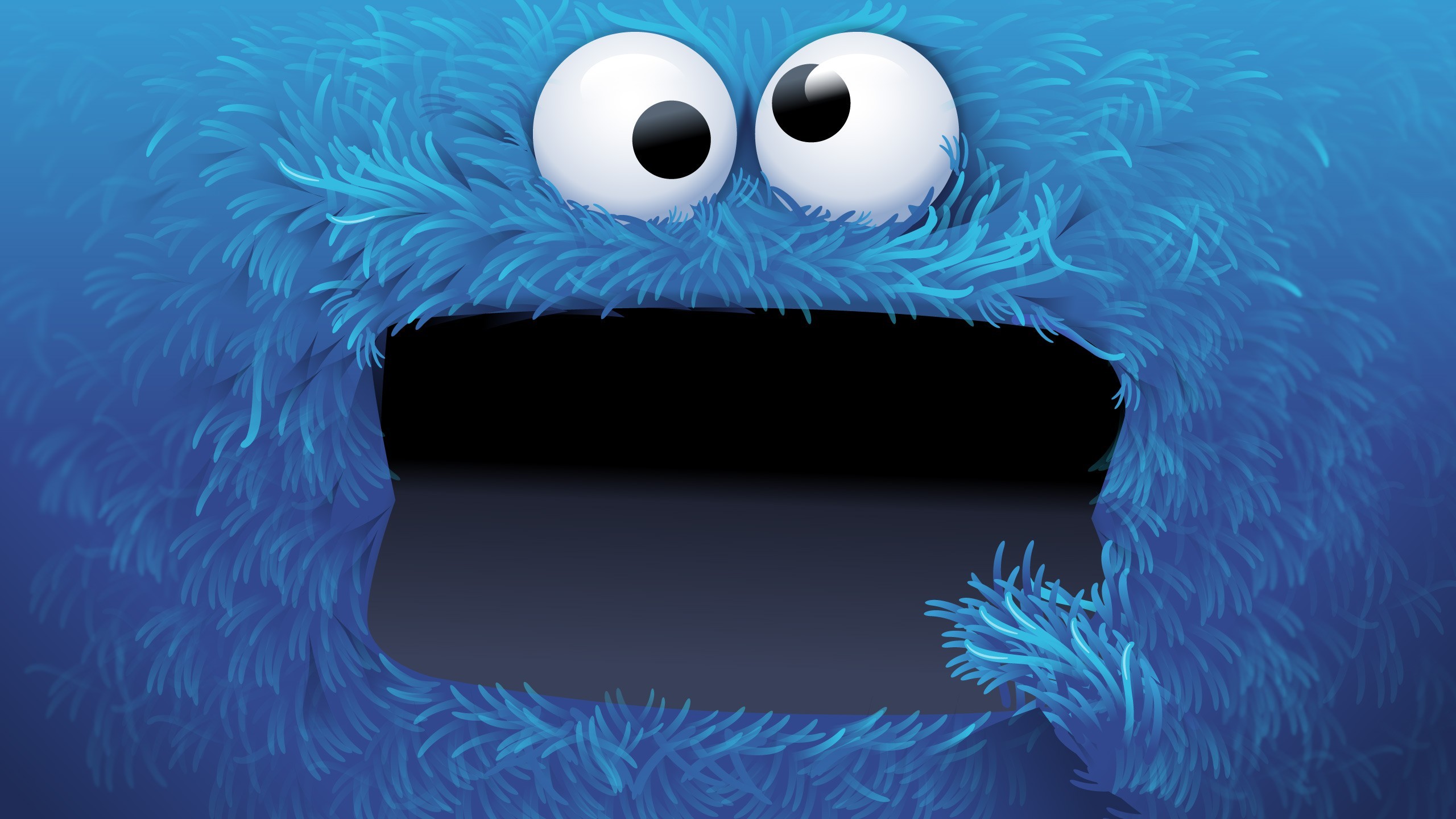 Close-up of a cute, furry blue cartoon monster with wide eyes and an open mouth, ideal for a cheerful and playful wallpaper