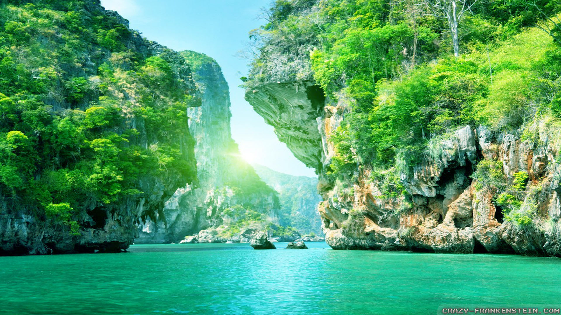Lush green cliffs overlooking a turquoise bay in a tropical paradise