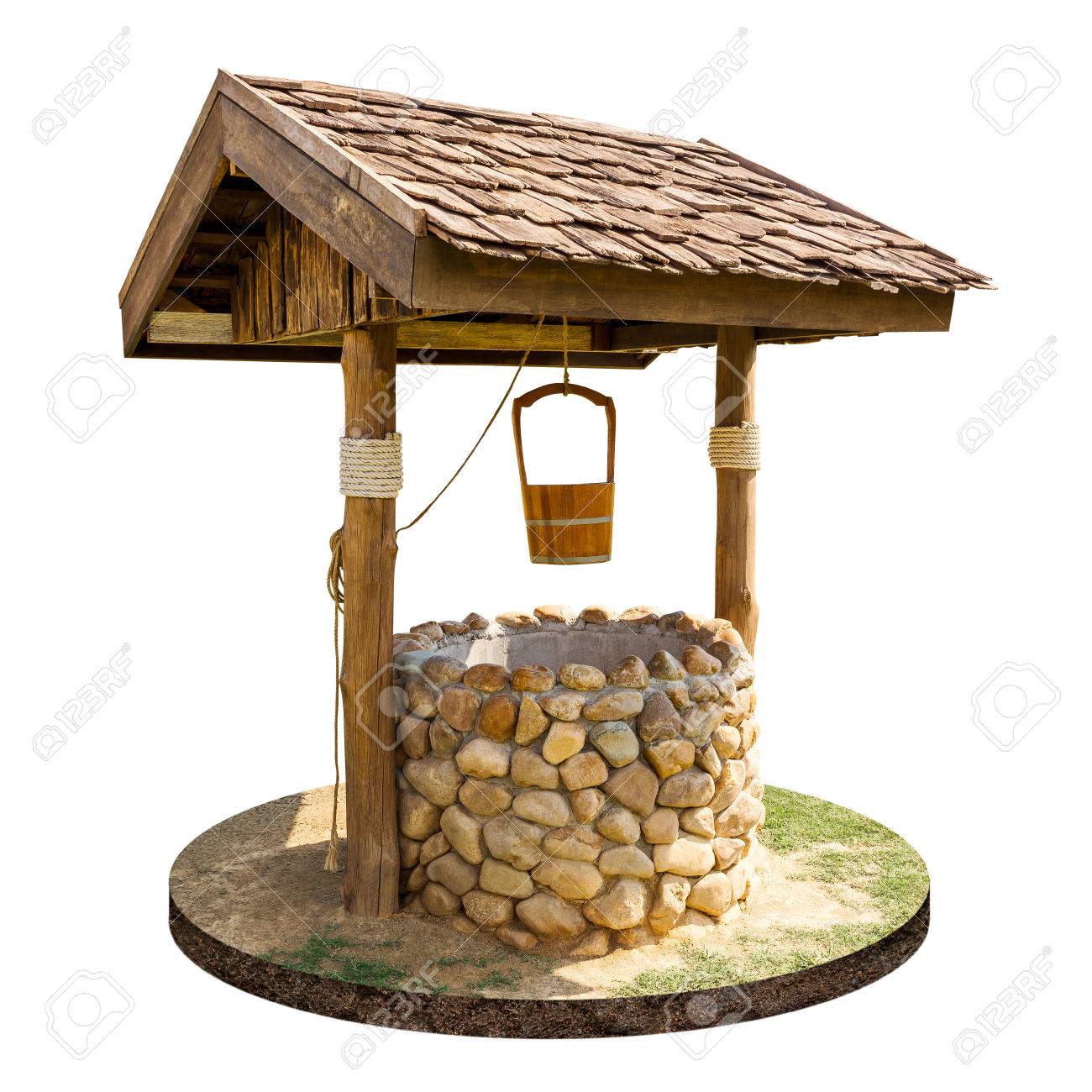 Ancient Artesian Well And Wooden Roof With Hanging Wood Bucket