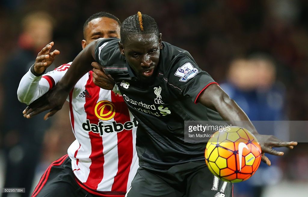Mamadou Sakho of Liverpool vies with Sunderlands Jermain Defoe