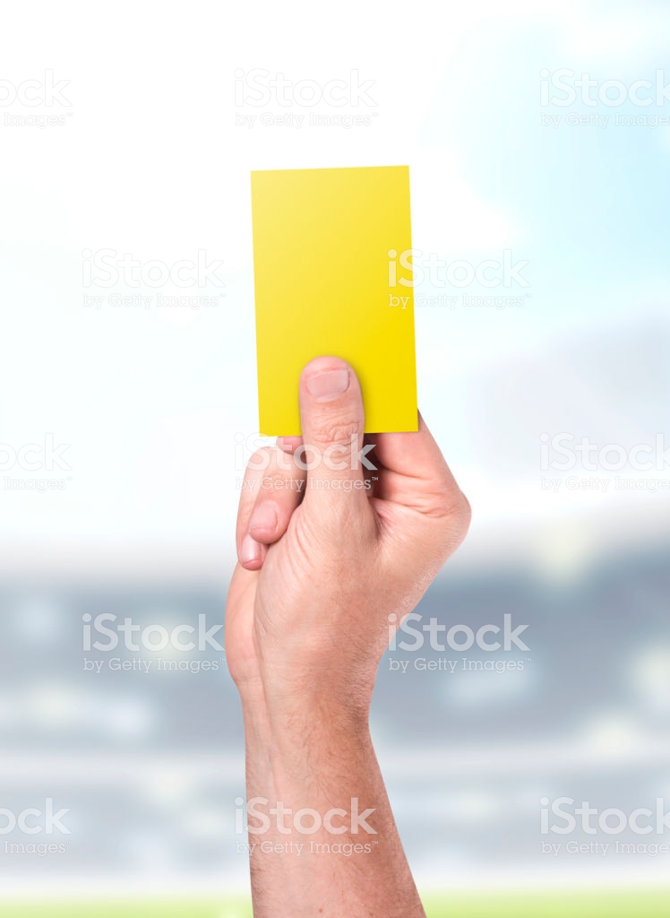 Yellow Card On Stadium Background Stock Photo Image Now